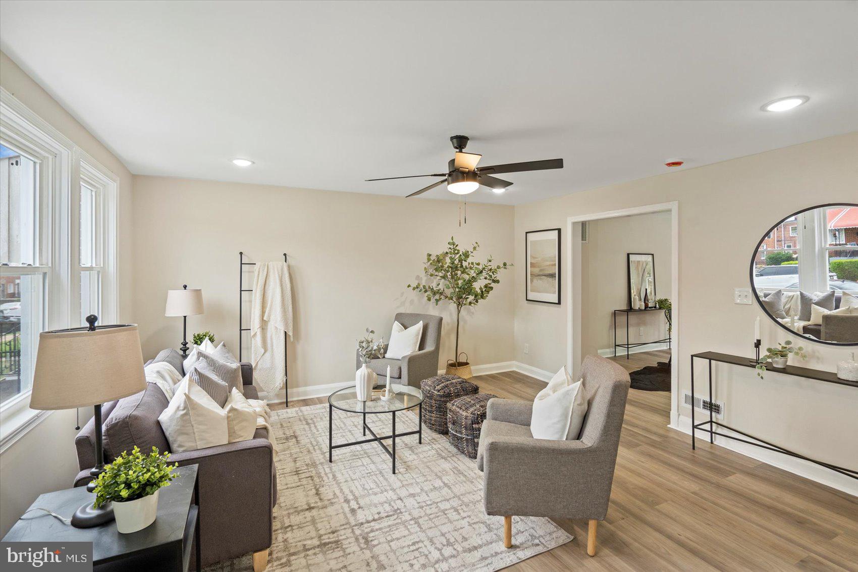 Welcome home to this beautifully renovated gem in the heart of the Belair Edison neighborhood! Step inside to find a spacious main level featuring a bright, open living room, perfect for entertaining and a stylish dining area ideal for gatherings. The kitchen is an absolute showstopper, showcasing white shaker cabinets, gleaming quartz countertops, gold hardware, and brand new stainless steel appliances. Upstairs, enjoy three generously sized bedrooms and a stunning full bathroom with custom tile work. The finished lower level offers incredible bonus space with a second full bathroom, a laundry area, and a utility room. Perfect for guests, a home office, or recreation. Outside, the extra-large, fenced-in rear yard provides a private retreat for relaxing, playing, or entertaining. Don’t miss your chance to own this beauty. Schedule your tour today!