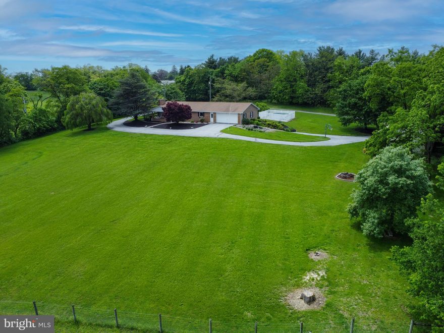 Mountain Views surround this meticulously maintained all Brick Ranch Home on 2 Acres.  3-bedroom, 2-bath ranch that blends comfort, style, and outdoor living.  The main level offers 1800 square feet of living space while the basement adds additional finished space of nearly 1000 square feet.
Oak wood flooring flows throughout the main level living spaces.  Quartz countertops compliment the updated kitchen.  The Brick fireplace and lots of natural light accent the large living room.
Big Spring High School is just minutes down the road for the convenience of kids activities and sporting events.
Downstairs, enjoy the versatility of a finished basement—ideal for a family room, home office, gym, or game room.

Step outside onto the custom paver walkway, unwind on the gazebo or covered front porch.   Fenced above ground pool.  Whether you're enjoying your morning coffee or hosting a summer barbecue, this property is made for relaxed living.

Additionally, there is a 24x36 workshop and a 36x16 open barn with a loft.

Conveniently located near major routes while offering a peaceful, semi-rural setting, this home is a must-see!
