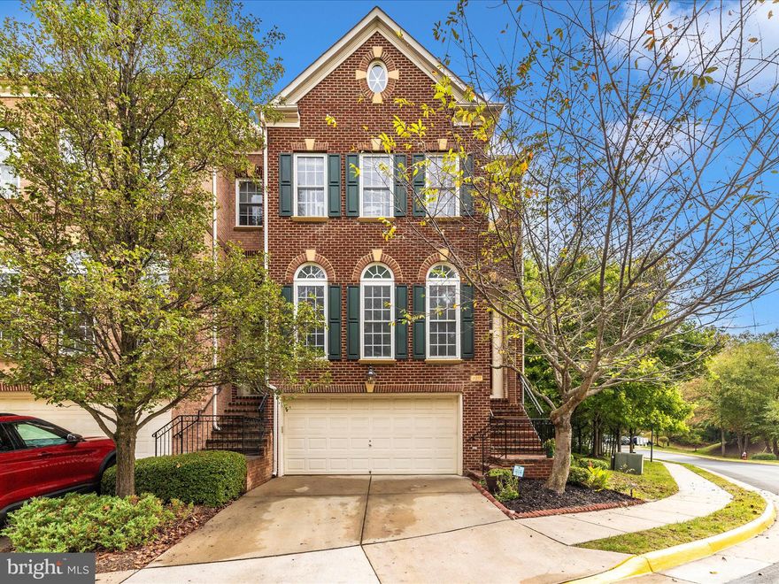 This exceptional end-unit townhouse offers a charming two-car garage and a serene setting nestled among mature trees, providing both privacy and picturesque views. The interior boasts a freshly painted canvas with high ceilings, creating an airy and inviting atmosphere. Elegant hardwood floors grace the living and dining areas, while the chef's kitchen delights with Corian countertops, stainless steel appliances, 42-inch cabinets, new flooring, and a cozy breakfast nook. A welcoming family room completes the main level's functional design.

Upstairs, the spacious primary suite features new laminate flooring, a tray ceiling, a generous walk-in closet, and an en-suite bathroom. The walk-out lower level includes a recreational room and a third full bathroom, offering ample space for relaxation and entertaining. Conveniently located just moments from Fort Belvoir, this home epitomizes modern living at its finest."