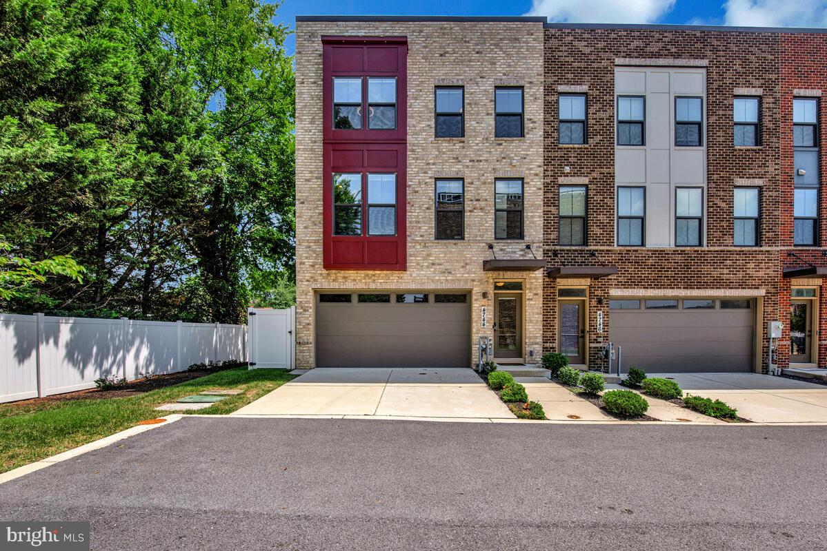 Modern 5-Year-Old End-Unit Townhouse Just Minutes from DC!
Welcome to this stunning 3-bedroom, 2.5-bath end-unit townhouse located in the heart of Suitland, MD. Built just five years ago, this move-in ready home offers the perfect blend of modern design, comfort, and unbeatable convenience—just steps from the Green Line Metro Station, the U.S. Census Bureau, and the Suitland Federal Center, and only minutes from downtown Washington, DC and all major thoroughfares.
Inside, you’ll find a bright and open floor plan freshly updated with new paint, new plush carpeting, and new luxury vinyl flooring. The spacious kitchen is a showstopper, featuring stainless steel appliances, granite countertops, dual pantries, an extended island, recessed lighting, a built-in coffee bar, and a custom wine rack. Just off the kitchen, enjoy your private balcony, ideal for morning coffee or winding down in the evening.
The upper level boasts a generous primary suite with a walk-in closet and a spa-like oversized shower with dual shower heads and a resting bench for extra relaxation. Two additional bedrooms with modern ceiling fans, a full hall bath, and a convenient upper-level washer and dryer offer comfort and functionality. Throughout the home, custom window shades add a modern, finished touch.
The lower level features a fully finished walkout basement that opens to a beautifully landscaped, fenced backyard—a perfect space for entertaining, gardening, or relaxing outdoors.
Additional highlights include a two-car garage with epoxy flooring wired for an electric vehicle charger, abundant natural light from three sides, a high-efficiency tankless instant hot water heater. The home is located near newly built schools, shopping, and the Suitland Performing Arts Center, providing everything you need within close reach.
Community amenities include a sand volleyball court, outdoor exercise equipment, horseshoe pit for entertaining, playground, dog park and benches throughout to relax and enjoy the scenery.
Best of all, the HOA fee includes Verizon Fios internet, cable and landline, delivering both value and connectivity.
This is a rare opportunity to own a stylish, energy-efficient, and well-located home just outside the city.
Schedule your private tour today!