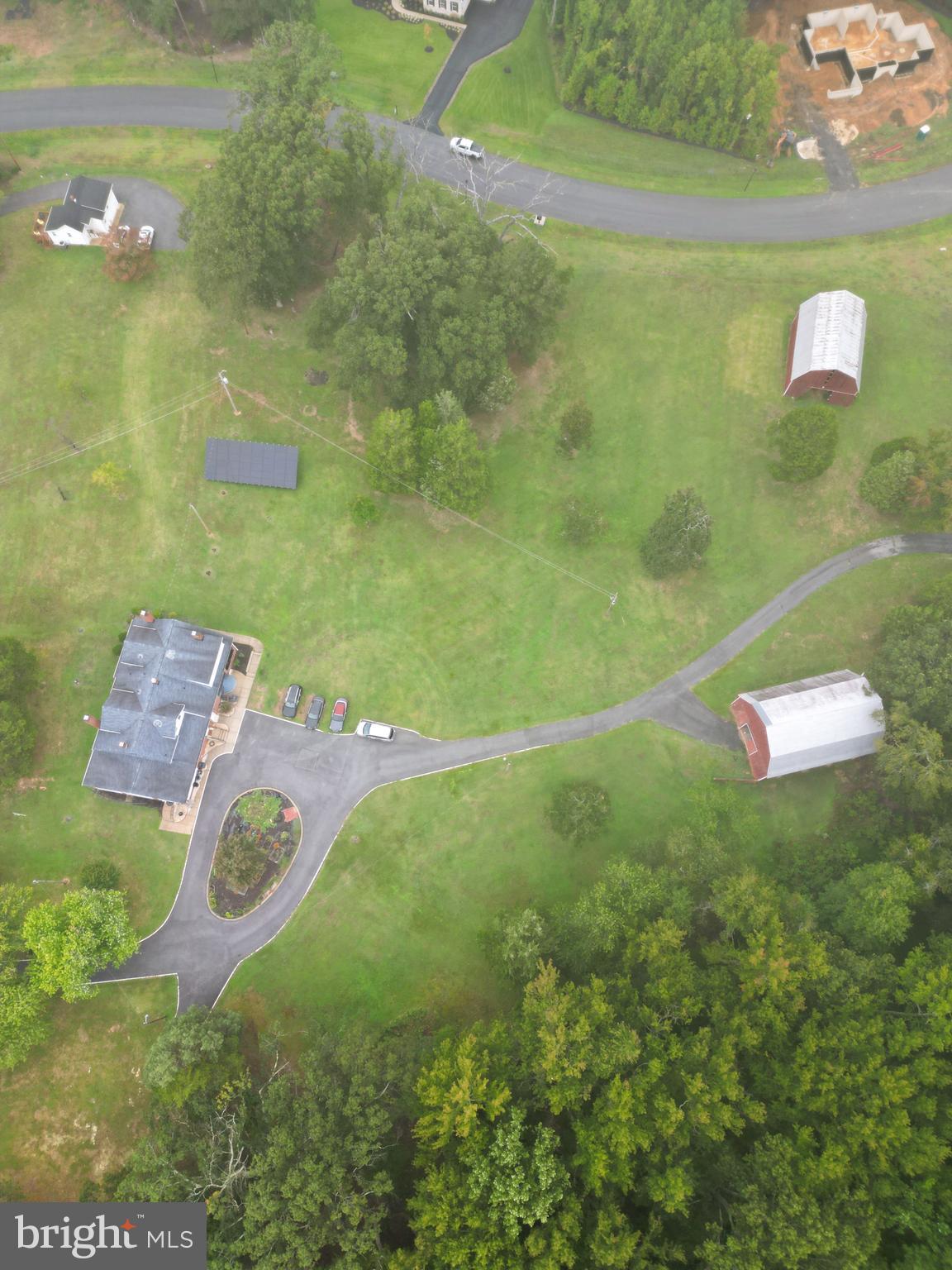 Take a look at this gem in Brandywine, Md. A rare 4 bedroom, 4 bath estate on over 10 acres, offering the perfect blend of privacy, space, and style. This 4,300+ sq ft home features a long private driveway, beautifully landscaped yard, and two barns - perfect for horses, storage, or future projects. The main home offers spacious living and dining areas, a bright, expansive chef-inspired kitchen, and private bedroom retreats. It comes complete with a separate living quarters with 2 beds, 1 bath, and NO HOA! This is perfect for multigenerational living, guests, or rental income. This estate includes a paid-in-full solar system, providing sustainable, cost-effective living.
With its serene setting and stunning views, this property is your chance to own a true Brandywine retreat while staying close to major commuting routes, shopping, and dining.