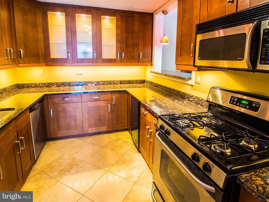 New Pricing: GORGEOUS  Deluxe 1 BR/BA w beautiful Chef's kitchen, Brazilian cherry wood floors throughout.Just painted all neutral walls.Garage pkg. Resort-type amenities on new arcade level: indoor/outdoor pools, gym, tennis courts, cafe, new gas grills, EV stations, market. 24-hr concierge, Ride-on bus.  New corridors, lounge, game rm. All utilities included.  NO smoking.  NO pets.