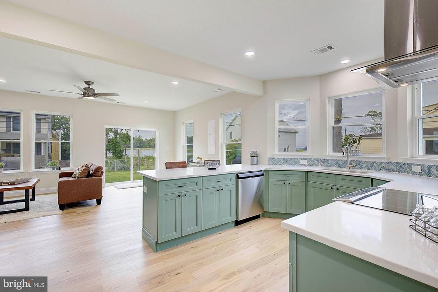 Take a look at this beautifully renovated classic North Beach Cottage home is now available for sale. This home offers one level living with water views from not only your family room but also your kitchen, back yard and the one of a kind outdoor living space.  Not all homes in this community offer water views year round or at all.  You will fall in love with the finishes of this home as they were carefully selected to revitalize this home and keep it in the quaint beach town cottage style North Beach has to offer.  Yes  everything is new from the roof to the floors and more. The natural vinyl plank flooring and an abundance of natural lighting compliment the kitchen with new cabinets, quartzite counters and butcher block. The Stainless steel appliances and the open floor plan create a warm airy space with views all day long. Step outback to the fenced back yard and see yourself relaxing on the deck or having a nice beverage under the cover of this amazing outdoor living space. Make this a game area, she shed, man cave or family space. You truly will not find another one like this in all of North Beach.  Nice corner lot with plenty of parking and a easy walk to all of the local restaurants and shopping. Let's not forget the boardwalk for daily walks and enjoy the beach as well. Not located in the hustle and bustle of the downtown area and only a few blocks from all of the happenings. Enjoy local music, local restaurants as well.  This is the perfect home in a superb location.  Owners are licensed Realtors. All Permits were completed and available upon request.  Make this home your home in the beach! Seller requests settlement with Thomas Pelagatti attorney at law.