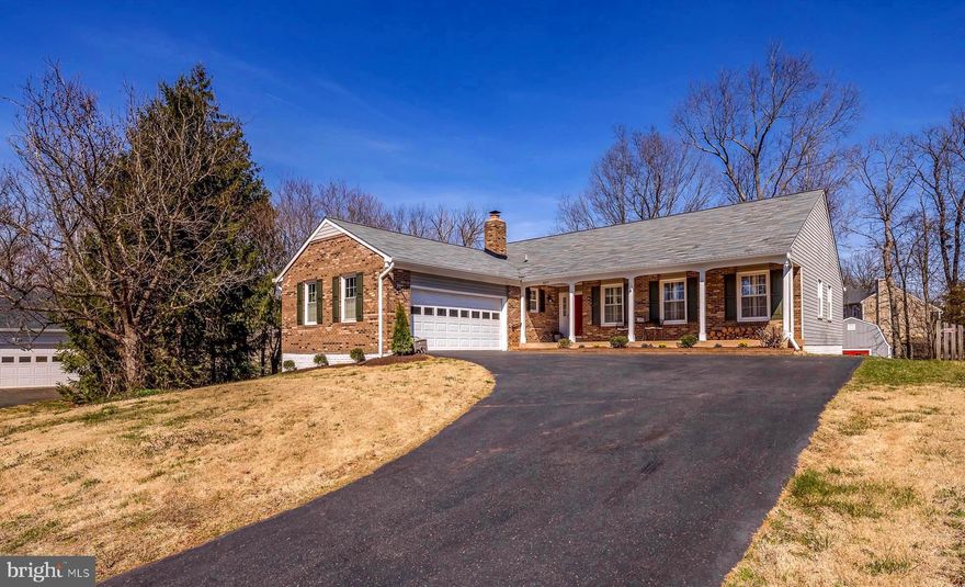 Welcome to this Beautiful 4 Bed 3.5 Bath Rambler Nestled on a Quiet Cul De Sac on a Premium (.52acre) Lot  that Backs up to Woodlands **Over 3900 Sq Ft on Two Levels** Cloverhill Subdivision** No HOA** **MAIN LEVEL** offers 3 Bedrooms, 2.5 Baths, Large Gourmet Eat in Kitchen with Open Concept to Both Living and Family Room Areas, A Laundry Room, and Easy Access to the 2 Car Garage. **LOWER LEVEL **(Walk Out) offers A Newly Remodeled Recreation Room with An Awesome Bar, 4th Bedroom, Full Bath, Workshop and Huge Storage Space or Future Finished Square Feet. Outside you have a Relaxing Front Porch, a Large Deck on the Back of the House, and a 10x14 Shed for Additional Storage. Fabulous Location!! Commuters will Appreciate the Close Proximity to Route 28, Prince William Parkway, I-66, and the Manassas VRE.  It is also Conveniently Located Near Shopping Centers, Cafes, Grocery Stores, as well as Charming Old Town Manassas.  Schedule a Tour! You Will Be Glad You Did!!