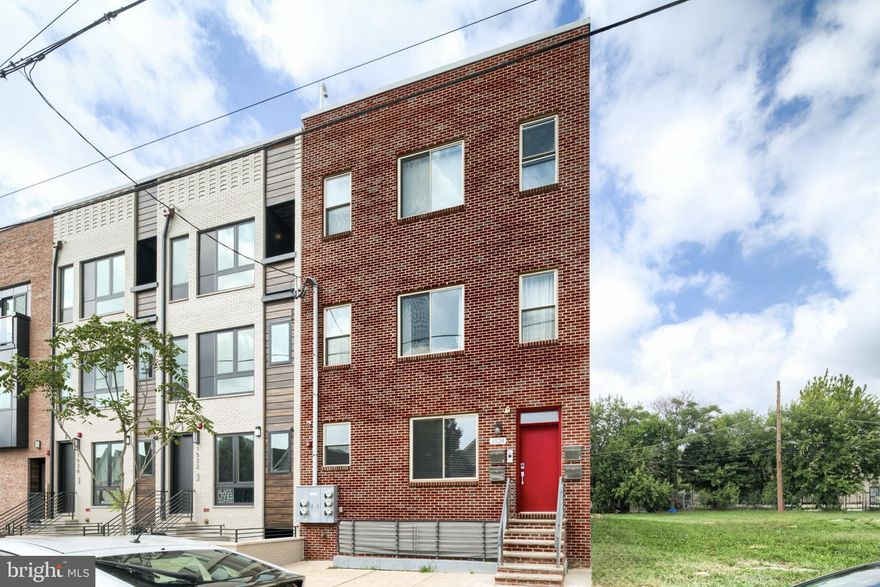 Welcome to 1524 N 8th Street Unit #1 — a stunning bi-level condominium located in the heart of booming Ludlow, just steps from Temple University, the train station, and nestled between the vibrant neighborhoods of Olde Kensington, Norris Square, and Fishtown. This spacious 2-bedroom, 2.5-bath home offers luxury living with a thoughtfully designed layout. Enter from the main level and be greeted by an open-concept living and dining area that flows into a beautifully upgraded kitchen, complete with quartz countertops, stainless steel appliances, designer cabinets, a tiled backsplash, and under-cabinet lighting. This level also features a spacious bedroom and full bathroom. Downstairs, the fully finished lower level offers a second living space with garden windows, a half bath, a large storage closet, laundry area with washer and dryer, and the expansive primary suite with an upgraded ensuite bath and private access to street level. Both bedrooms are generously sized with ample closet space and abundant natural light. High-end finishes include hardwood floors throughout, in-wall stereo speakers, smart thermostats, designer lighting, custom window treatments, a video intercom, and a security system. Enjoy the large shared courtyard in the rear — perfect for grilling and entertaining. Located near popular local spots like Human Robot, Poe’s Sandwich Joint, and Sutton’s, and offering easy access to public transportation via SEPTA Route 47. This turnkey condo is a fantastic opportunity in a rapidly developing neighborhood. Schedule your tour today!