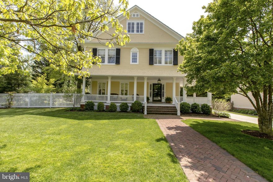 Quintessential 4 level Renovated 1895 Village home on spacious lot!  Inviting front porch, Grand foyer w/ decorative fp, living rm w/fp, dining rm w/fp & china cabinet.Sun-filled family rm adjacent to spacious Kit & casual dining area opening to deck, pool, pergola covered al-fresco dining area, & large garden. Beautiful MBS w/ WI closet & BA, plus 5 bdrms, LL game room, LA, Gar,Geo-thermal System