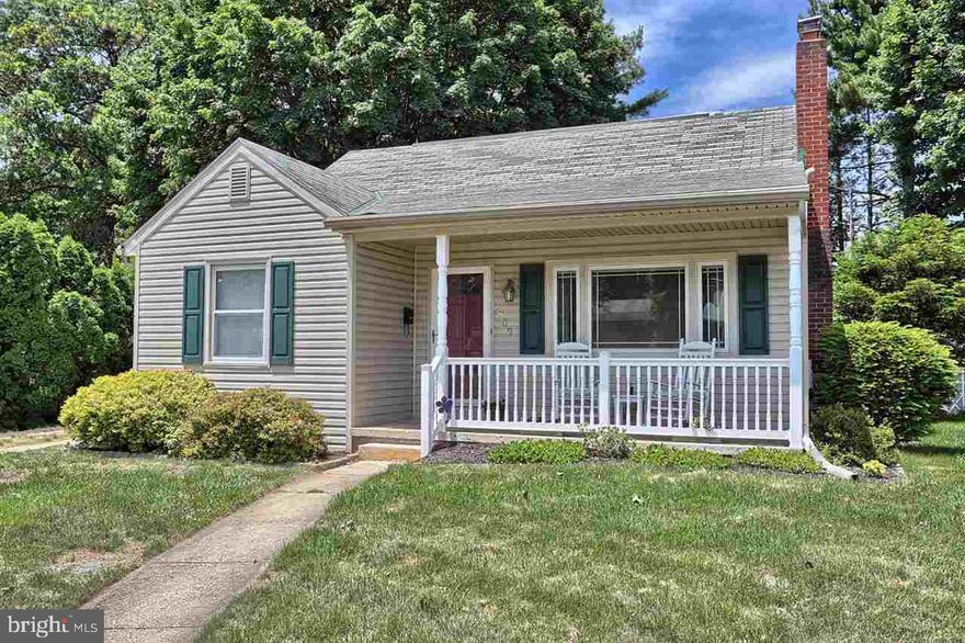 Extremely well cared for and updated cape cod located on a lovely street in charming New Cumberland.  Fabulous new kitchen w/ solid surface counters and stainless appliances. Hardwood flooring throughout,  spacious living room w/ gas fireplace, new bathroom, 2nd floor features the 3rd bedroom w/ built-ins and loft area, finished lower level w/ ample storage, new windows, siding, wonderful covered front porch to spend time, large private yard & much more!