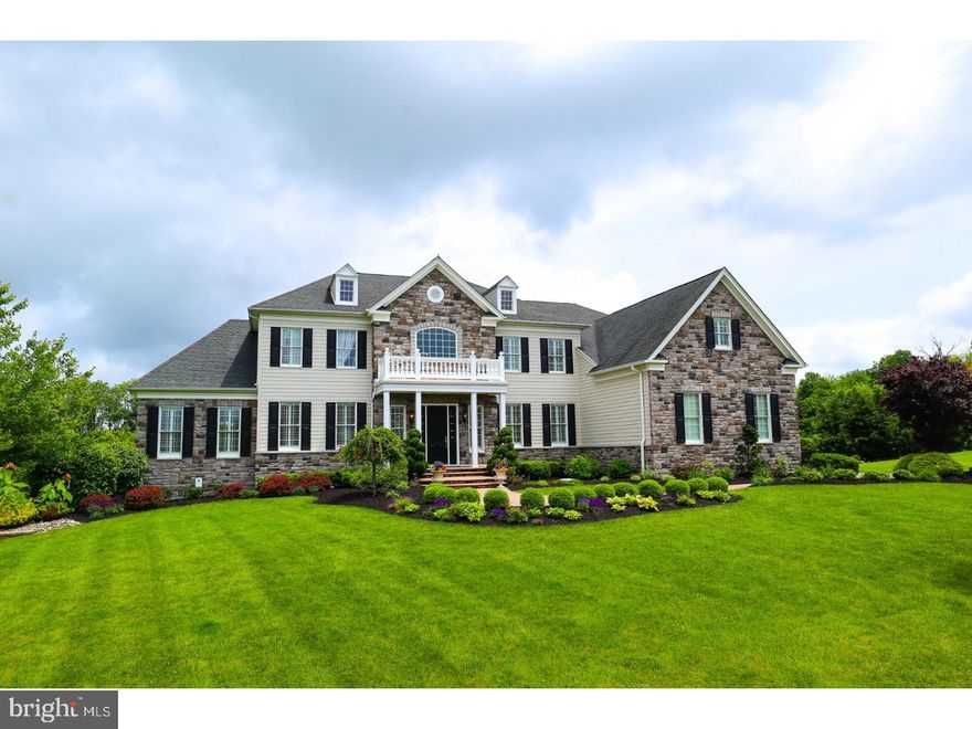 Situated perfectly on a premium, immaculately manicured one acre lot sits this spectacular, classic Henley Georgian model, Toll Brothers most popular floor plan. With its neutral stone/Hardie Plank exterior, this barely 8 year old home offers the discriminating buyer a wide array of luxury, comfort, and construction features, and is in mint move-in condition. Enter the two story foyer featuring dual curved staircases with gleaming oak treads and iron balusters, gorgeous white marble flooring. To the right, your formal dining room, to the left your formal living room with French Door entry to the conservatory featuring walls of windows and vaulted ceiling. A bright library w/built-ins, cozy family room with fireplace, 2 powder rooms, and large mud room add luster to the main floor.  The gorgeous gourmet kitchen is a chef's delight, featuring a large center island, granite counters, beautiful stainless steel appliances including a 6 burner range, 2 sinks, 2 dishwashers, giant pantry, sit down work space, convenient rear staircase, and expanded greenhouse breakfast area w/triple French Door access to the deck. Featuring over 1,400 sq. ft, the maintenance free deck overlooks the pool and fully fenced rear yard, which is worthy of a five star resort. Only 3 years old, the Anthony Sylvan Pebbletech salt water pool with max 10' depth is extremely private, has a Turkish Silver Travertine surround, custom Jacuzzi and waterfall, cabana, pergola, stone bar and full outdoor kitchen.  The home's upper level features a gracious Master Bedroom w/sitting room,  luxurious Master Bath w/his and hers commodes and large walk in closet. Three additional bright and airy en-suite bedrooms, bonus room/5th bedroom, & large laundry room complete the upper level. The lower level of the home is by far and away the most spectacular available on the market today. With approximately 2,500 finished square ft. it features a full bath to service the pool, card room, gym, theatre area, incredible full service bar/island with quartzite tops, custom cabinetry, 2 wine refrigerators, 8 foot horizontal fireplace, French Oak floors, quiet rock insulation, and more. Additional features of this home include Bose Surround System, ample elegant crown moldings & trim, 10' first floor ceilings, gleaming Brazilian Cumaru wood flooring, professional landscaping/lighting, 4 zone high efficiency HVAC, 3 car garage, security system and more. With over $600k in recent seller upgrades, your new home awaits.