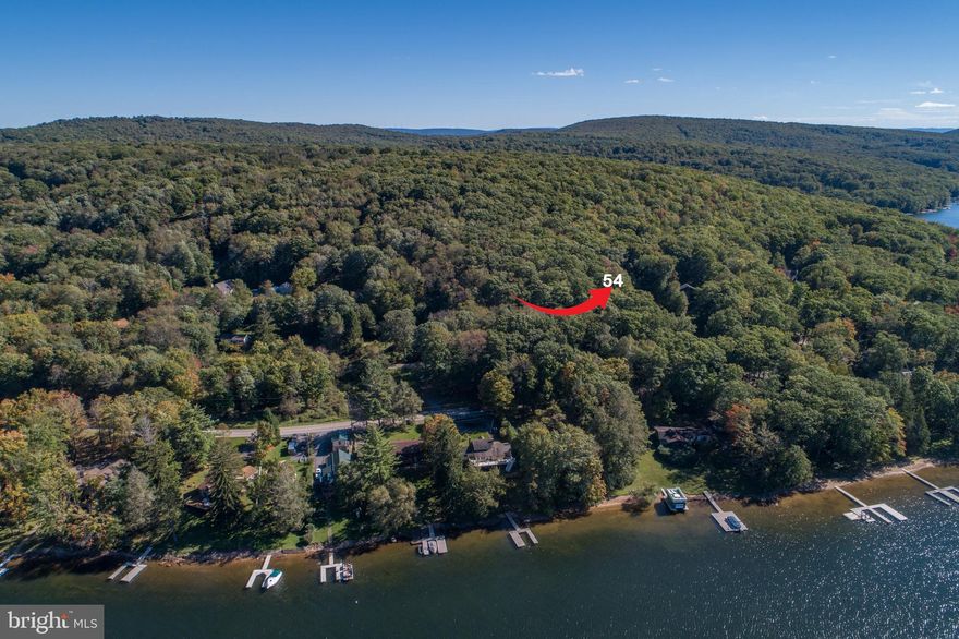 0.3 acre lot located on Sloan Tract Road, right off of Lake Shore Drive with filtered views of the beautiful Deep Creek Lake. Conveniently located minutes away from WISP,  Deep Creek Lake State Park, many restaurants and more.

Neighboring parcel (lot 53) also for sale.

Being Sold subject to connecting to Public Utilities. Verify details with Garrett County Public Utilities.