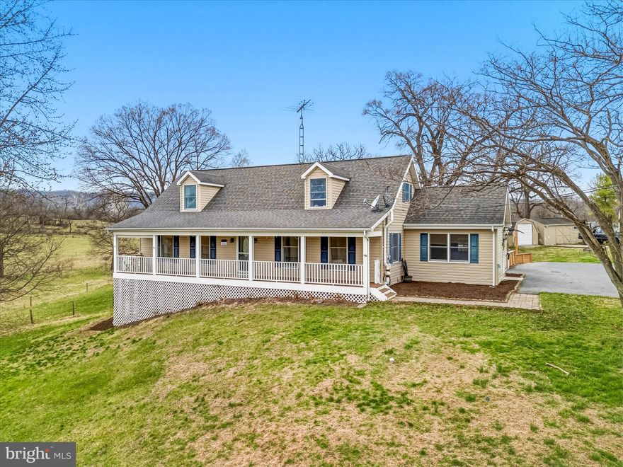 Welcome to 1373 Lost Road, set on nearly 2 acres with serene mountain and pasture views, this beautifully upgraded home offers the perfect blend of comfort, space, and lifestyle. Inside, you’ll find abundant natural light, fresh neutral tones, a main-level primary suite, granite countertops, gas range, cozy fireplace, and convenient main-level laundry/mudroom. The partially finished basement adds flexible living space for work, play, or guests.

Step outside to your private retreat featuring a 21-ft saltwater pool, composite decking, covered porch, stone firepit, two sheds, and a partially fenced area ideal for a hobby farm, plus a wet-weather stream.

Backing to preserved farmland for added privacy, yet just minutes to I-81, this property delivers peaceful country living with everyday convenience.