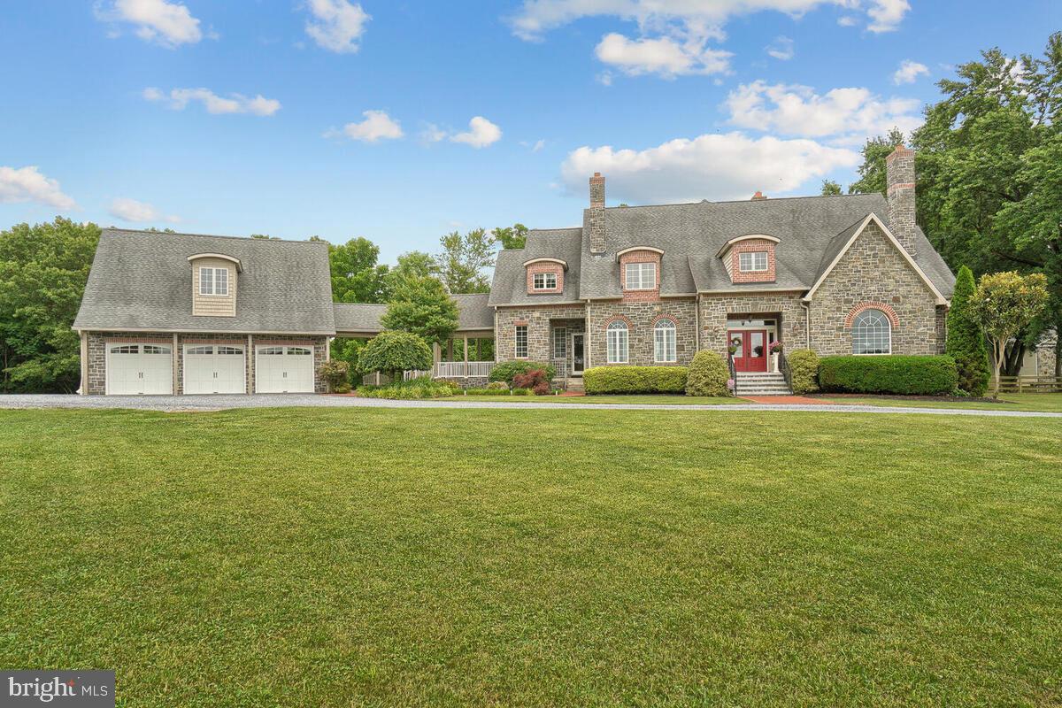 Make this house you're home and you will believe that dreams do come true. This custom-built home has Adirondack stone and sits on 25 acres with a 12-foot-wide stream, if you’re looking for privacy you have found it. The double door entrance leads you into the open foyer. You will find a formal dining room to your left and a huge office on your right. The family room is two story with a 19-foot stone fireplace and opens up into a gorgeous terrace for entertaining. The main level primary bedroom has a coffered ceiling with lighting and dual closets that are custom complete with built-ins. Don't forget your primary bath that has absolutely gorgeous stone and a free-standing tub that has a large open window with a beautiful view to lay back and relax! Not to mention the large frameless shower that finishes out this breathtaking bathroom. The kitchen has natural cherry cabinets, granite counters, an oversized farm sink and stainless steel appliances! The large pantry and informal family room are just bonuses to this home! You will work your way around to a large mudroom that has a separate washer and dryer as well as a private entrance that leads to a breezeway that continues to a three-car attached garage. Above the garage there is an apartment for out-of-town guests that is approximately 564 square feet. The second level has a movie theater with a half bath that you can turn into a bedroom. There are two other bedrooms that share a dual bathroom as well as another large bedroom with its own private bath. The basement is a blank footprint for you to make your own. Last but not least a separate 5,000 sq. ft barn that can be used for your work shop or business with tons of room for all of your needs. This beautiful home has so much to offer it is impossible to list everything. Schedule your private showing today.