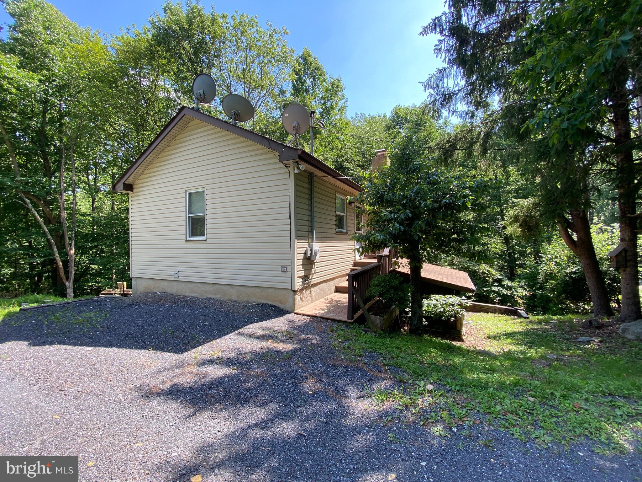 Charming cottage in a peaceful wooded area with wonderful back yard rolling stream views! This two-level Cottage is located in the mountains of Thurmont, on the same property as the owner's main home . With approximately 950 square feet of living space, it offers 2 large entry level bedrooms with plenty of closet space and a full bathroom. In addition there is a large 14x6 back deck overlooking the stream, a spacious living room on lower level and an eat-in kitchen with washer and dryer. **Pets are on a case by case basis with additional rent!