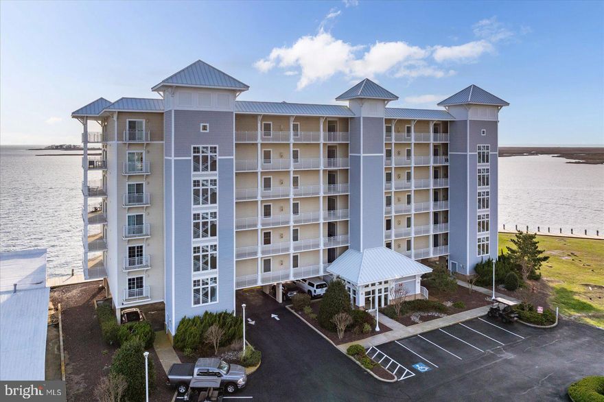 The best location for a condo!  Top floor, corner unit has spectacular panoramic views of the Tangier Sound, Annemessex River, and beyond to the bay!  Wrap around deck provides views and porch space to the west (for those spectacular sunsets),  north and east!  Kitchen has all upgraded black stainless appliances, granite countertops, tiled flooring.  Dining area and living room have wood flooring. Laundry has upgraded appliances as well.   Primary suite has direct access to the screened porch and a large primary bath with jetted tub and shower, and walk in closet.  Two additional bedrooms have a hall bath conveniently located nearby.  The well maintained pool is a bonus, and there are boat slips available in the Harbour Lights marina.  The location is within walking distance to restaurants and shopping, and if you want to visit Smith Island, the ferry boats are located at the City Dock!