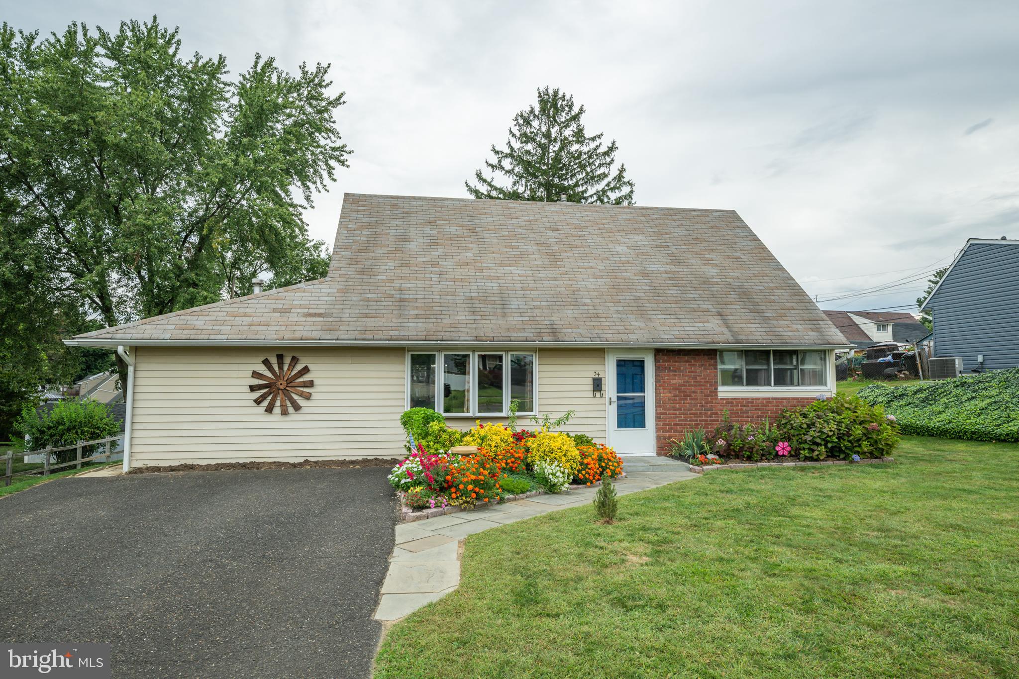 Welcome home to this charming 4 bedroom Jubilee style home located in the highly desirable Highland Park community of Middletown Township. A beautifully landscaped front garden creates a warm welcome as you follow the private pathway to your front door. Boasting thoughtful upgrades and neutral colors throughout, this home offers both style and comfort. Step inside to your bright and spacious living room featuring a large bay window, crown molding and a ceiling fan. The living room flows seamlessly into your eat-in kitchen, where an oversized window frames a gorgeous view of your backyard. The kitchen boasts a stylish tile backsplash, upgraded appliances—including a newer dishwasher and oven—and ample cabinet and counter space, complemented by a separate dining area perfect for family meals and entertaining. Just beyond the dining area is a versatile mudroom/ laundry room featuring direct access to your outdoor patio and is outfitted with built-in shelving and cabinetry, perfect for added storage! Situated on the right side of the main level, you’ll find two spacious bedrooms, each filled with natural light and equipped with ceiling fans, a hallway linen closet for convenience and a full bathroom with a beautifully tiled tub-shower combo. Upstairs offers two additional bedrooms that feature NEW plush carpeting. A standout feature of one of the bedrooms is the expansive walk-in closet, offering abundant storage and organization. A second full hallway bathroom with a tub-shower combo completes this floor. Step outside and discover your backyard retreat, anchored by a paver patio perfect for entertaining or enjoying your morning coffee. The spacious yard offers plenty of room for outdoor games and activities, while a bonus shed provides convenient storage for all your tools and equipment. Other recent upgrades include NEW water heater, newer central AC unit, NEW storm door, several new windows on the main level AND new pavers on the front walkway. Ideally located near a variety of shopping and dining yet close to the Langhorne Train Station with service to Center City, as well as major roadways for easy commuting! Don’t miss your opportunity to tour this beautiful home today!