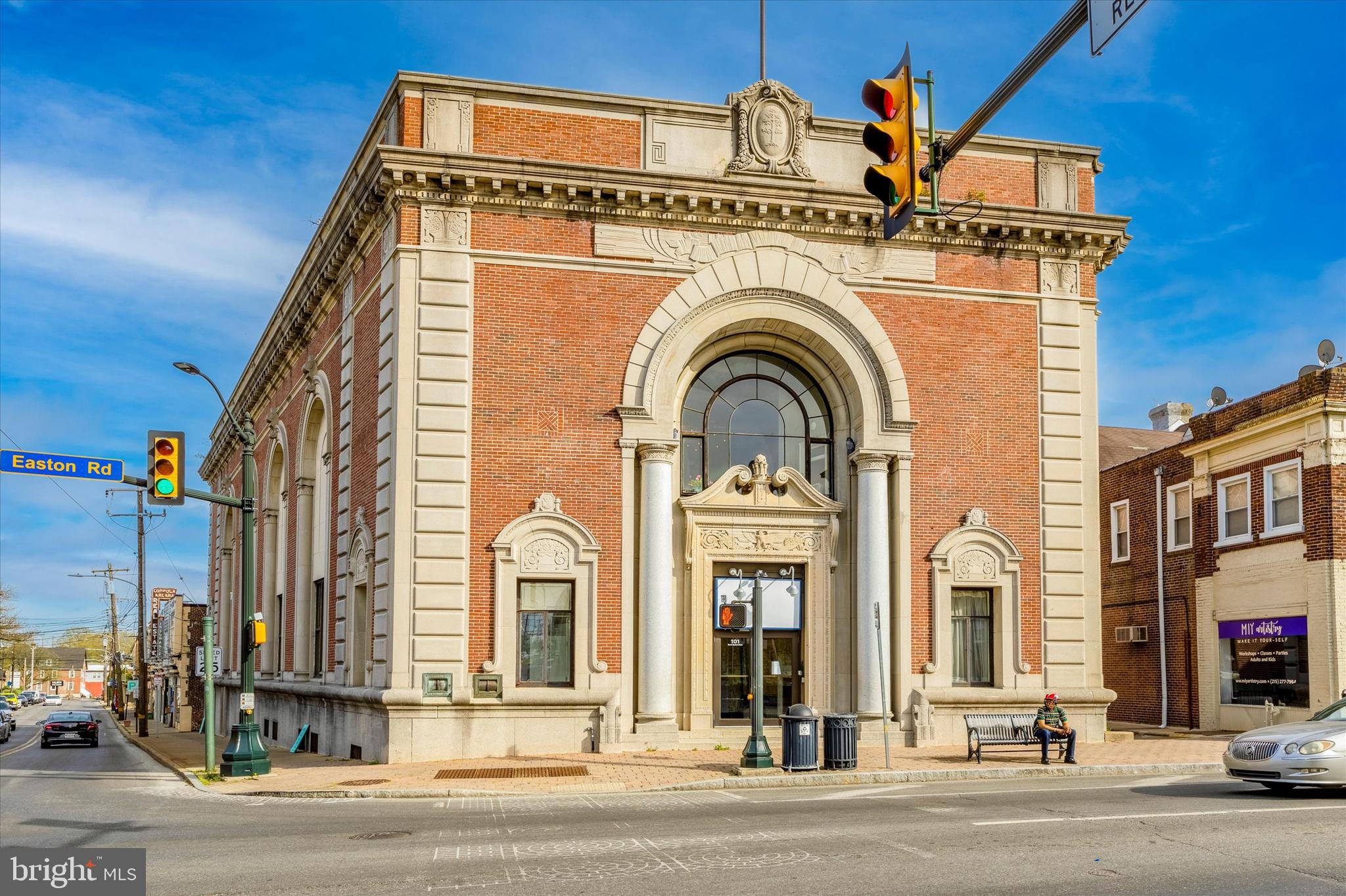 This prime building was built in 1920 and used as a bank for 102 years, it is now ready for a new "chapter". The building includes it's own 48 space parking lot and a side entrance. There are also 50 municipal spaces just behind and adjacent on Bickley. There is a drive through window too. The first floor is vast, open and has high ceilings. The large windows flood the space with natural light. The Vault makes a beautiful focal point and is bigger than some rooms. There are offices, a kitchen and bathrooms on the first floor. This would make a great restaurant, bank, retail space. event hall, church, art gallery; your imagination is your limit. Or develop it into something totally different.
The second floor on the south end has bathrooms, and an office space that is currently occupied by a tattoo parlor. The third floor has a kitchen and large office suite that is currently vacant. There is a closet adjacent to the stairs that could be an elevator shaft as there is one on each floor. The North/front end of the building on the second floor has a large office and a conference room with bathroom that overlooks the Septa station that is across the street. Located in the MU1 Zone.