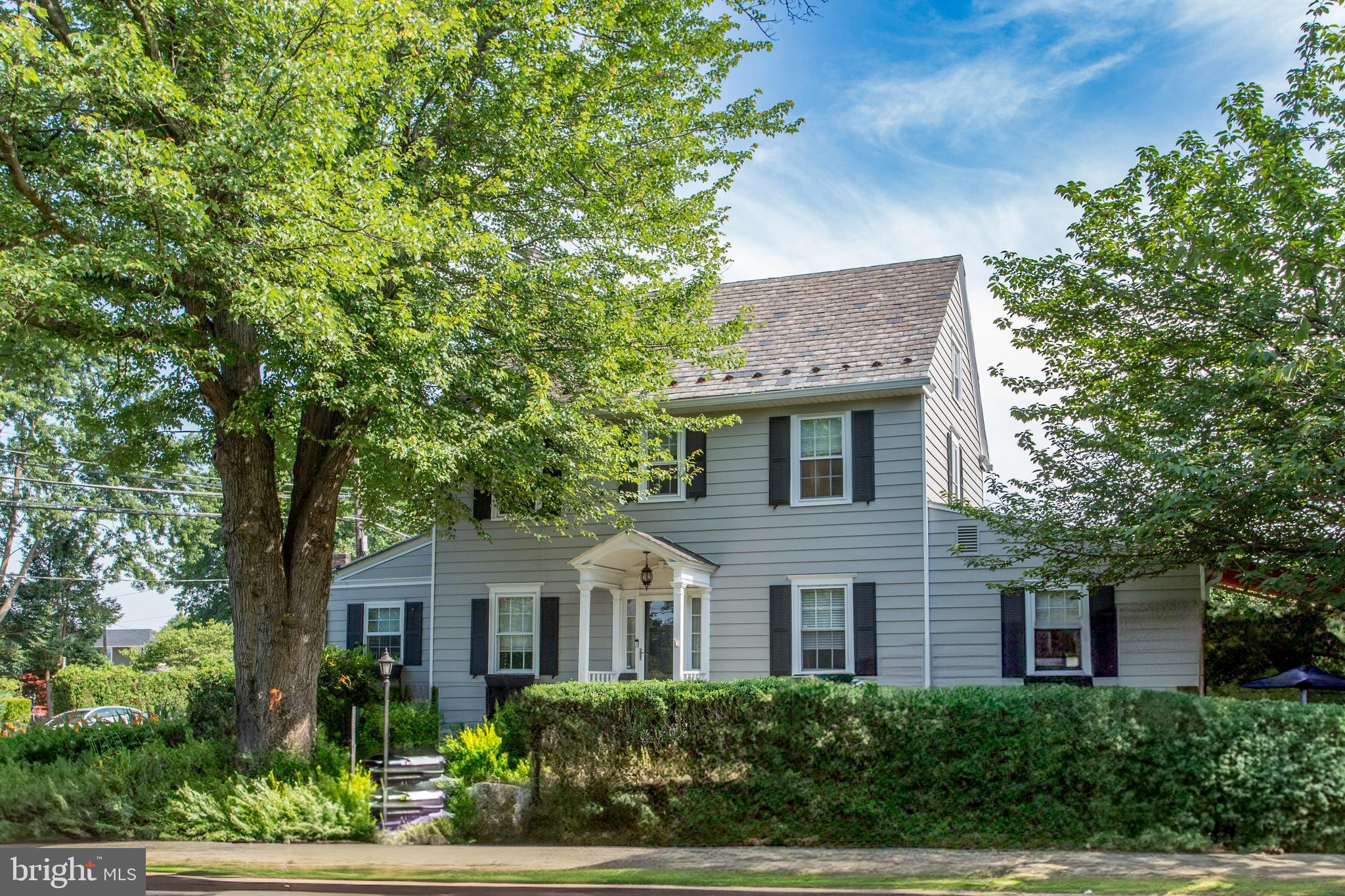 This charming Colonial home blends historic character with modern luxury, offering a perfect balance of comfort and style. Lived in by the same family since 1926, it has been beautifully maintained and upgraded throughout the years. The kitchen features new cabinets, granite countertops, and high-end stainless-steel appliances, while the upgraded bathrooms and flooring add a fresh, contemporary touch. Spread over three levels, including a finished attic, the home provides ample living space for both relaxing and entertaining. The first-floor sunroom has been used as a bedroom and office with the addition of a full bath, offering versatility to suit your needs. The detached garage includes a fantastic second-floor space, ideal for a hobby workshop, storage, or additional creative uses. Outside, enjoy the newly built wooden deck, perfect for gatherings or unwinding, complemented by a large, remote-controlled awning that provides shade on sunny days. Located in the desirable Saucon Valley School District and the Borough of Hellertown, this home offers the convenience of nearby restaurants, shops, and easy access to Rt 78.