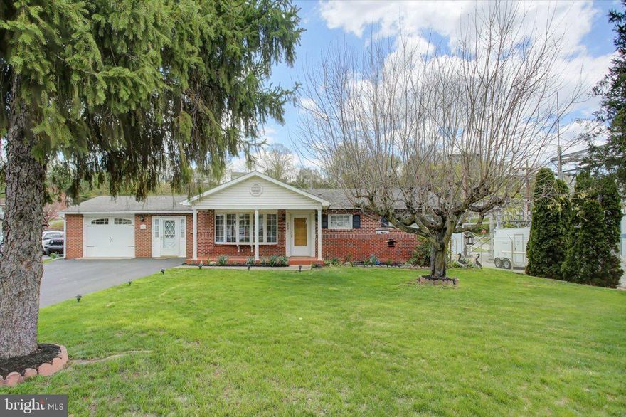 Multiple offers received.  Offer deadline of Tuesday, April 22nd at 3pm.  Come take a look at this 3 bedroom home which truly offers one level living!  The brick exterior and tiled front porch give this home an expensive feel.  The mature landscaping offers an appealing front yard space! Through the front door you will find the living room which is flooded with natural light because of the beautiful bay window allowing views of the mature trees and wildlife out front.  The kitchen area has ample counter space and cabinets for storage. The dining space easily fits a table for four.  The three bedrooms are spacious and each have their own closet equip with automatic lights that turn on when the door opens.  The full bathroom has a sunken jetted tub allowing ease of ingress and egress! The central air conditioning keeps the temperature cool in the house but there are still ceiling fans for those who need the extra breeze!  There is a one car garage that's deep enough to offer a workshop at the back.  There are pull down steps into the attic that has boards down for additional storage.  The garage is open to the finished breezeway/mudroom area which houses the washer and dryer and offers a small utility sink as well. There's access to the front and back yard from the breezeway!  The backyard is fully fenced, some of which is privacy fencing.  There is a small shed for tool storage, a built in grill, a large storage shed with electric, and more.  The covered patio is an inviting spot for enjoying the backyard.  Sure...this rancher is a little "vintage", but with some cosmetic updates you can transform this solid 3 bedroom house into a lovely space to call home!