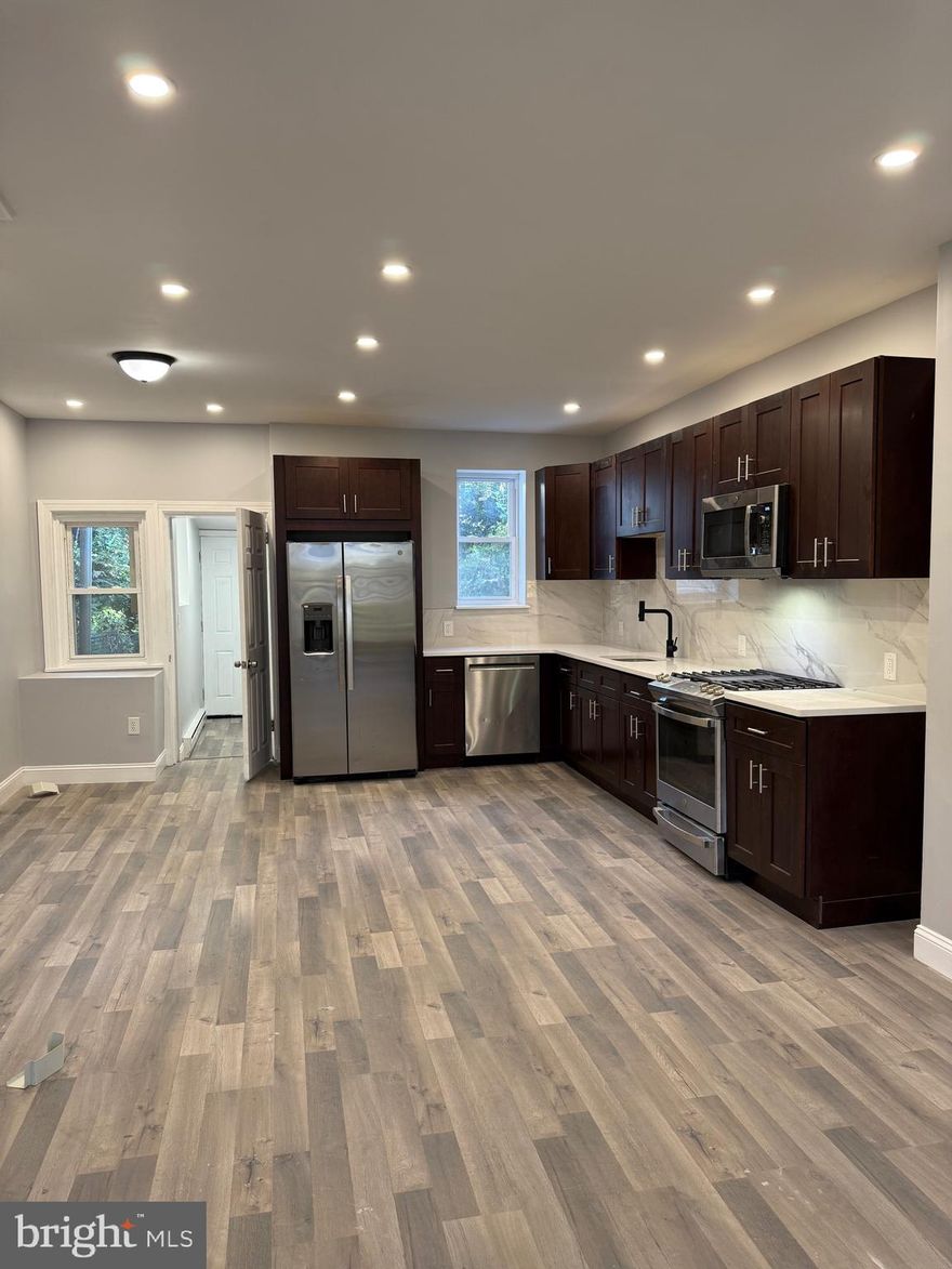 Stylish, Fully Renovated Townhome in the Heart of Overbrook

Step into modern comfort and timeless charm in this beautifully renovated 3-bedroom, 1.5-bath townhome nestled in the vibrant Overbrook neighborhood of Philadelphia. From the moment you enter, you’ll notice the quality craftsmanship, thoughtful design, and functional layout that make this home stand out.

The main level welcomes you with a spacious open-concept living and dining area, complete with updated lighting, ceiling fans, and a convenient half bath—perfect for guests. The sleek, fully updated kitchen features brand-new stainless steel appliances, including a five-burner stove, double-door refrigerator with ice maker, built-in dishwasher, and modern cabinetry that offers both style and storage.

Upstairs, three well-sized bedrooms provide comfort and privacy, along with a fully renovated full bath designed with clean, contemporary finishes.

Downstairs, the finished basement offers endless possibilities—create a cozy media room, home office, gym, or extra entertaining space.

Step outside to enjoy the covered front porch, or retreat to the private backyard—a great space for relaxing, gardening, or entertaining friends and family.

Located just minutes from Fairmount Park, City Avenue, public transit, shopping, and dining, this home offers the ideal balance of city living and neighborhood charm.

Move-in ready and thoughtfully updated from top to bottom—don’t miss your chance to make this Overbrook gem your own!