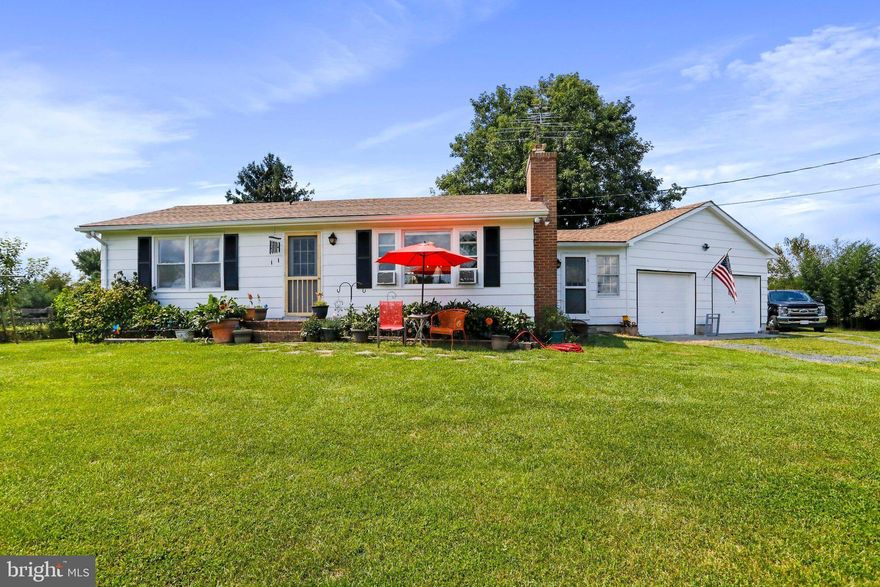 Bring your horses, cows and chickens! Well maintained 2BR, 1BA single family home with attached two car garage and 5 stall barn located on a beautiful 5-acre lot in Frederick County. Upgrades include new roof in 2022, updated kitchen with new cabinets and countertops in 2021 and fresh exterior paint. This home offers ideal main level living. Living/dining room combination will accommodate large family gatherings. Family room with wood burning fireplace will be the center of your entertaining. Efficiently designed kitchen with a large butcher block island that seats three. Laundry area off kitchen with stackable front loader washer/dryer. Kitchen opens onto wood deck to expand leisure activities to the outdoors. Spacious secondary bedroom with ceiling fan offers plenty of space for sleep, storage or play.  Enjoy the benefits the chicken coop and dog kennel have to offer (both can be removed if the buyer prefers). This is a place where you can get away, enjoy the beautiful views and enjoy nature.