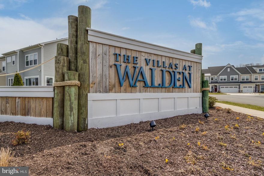 Nestled within the serene community of Villas at Walden, this exquisite townhouse embodies the perfect blend of modern luxury and coastal charm. Built in 2022, this residence showcases an open floor plan that invites warmth and comfort, making it an ideal retreat for those seeking a sophisticated lifestyle. Step inside to discover a beautifully designed interior featuring luxury vinyl plank flooring that flows seamlessly throughout the main living areas. The spacious family room, adorned with recessed lighting and ceiling fans, creates an inviting atmosphere for relaxation and entertainment. The combination kitchen and dining area is a culinary enthusiast's dream, equipped with high-end stainless steel appliances, including a built-in microwave, range, and dishwasher. The galley-style kitchen boasts upgraded countertops and a convenient island, perfect for casual dining or hosting gatherings. The thoughtfully designed layout includes an entry-level bedroom, providing flexibility for guests or a private home office. The primary bath features both a stall shower and a tub shower, offering a spa-like experience at home. Walk-in closets provide ample storage, ensuring that every inch of this home is both functional and stylish. Enjoy the gentle coastal breezes from your screened porch, an ideal spot for morning coffee or evening relaxation. The community amenities enhance the exclusive lifestyle, featuring a clubhouse, outdoor pool, and tennis courts, all designed for leisure and recreation. With a jogging and walking path nearby, staying active is both convenient and enjoyable. Parking is a breeze with an attached garage and driveway, providing easy access and additional storage options. The property is in excellent condition, ready for you to move in and make it your own. This townhouse is not just a home; it's a lifestyle choice that offers comfort, elegance, and a sense of community. Located on Burton's Prong of the Rehoboth Bay, The Villas at Walden will offer water access for kayaking, a clubhouse, two outdoor pools, and a pickle ball court. This convenient location is just 8 miles to downtown Lewes and Rehoboth Beach, and a stones throw to shopping, dinning, and local conveniences.  Experience the best of coastal living in a space that truly feels like home.  Better come see this one before it's SOLD!!!