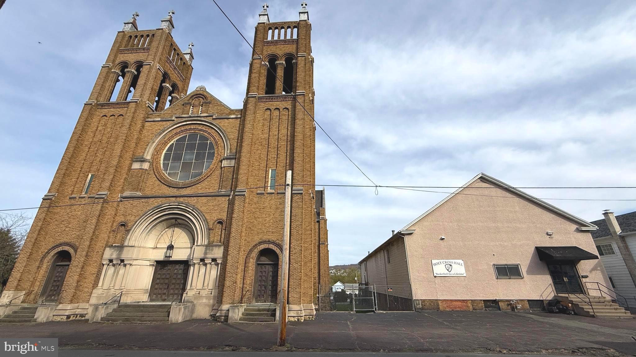 Here is your chance to own your very own church along with a banquet hall. The massive 16,000 sq ft church could be an ideal place for a residential conversion, continue as a place of worship for a religion wishing to upgrade to a larger building, or to be used for other commercial purposes. The banquet hall has a full basketball court, kitchen, classrooms, etc and can also be used for a variety of purposes. Both of the structures are very versatile can be used as either a lucrative investment opportunity or for other purposes. Schedule a showing today!