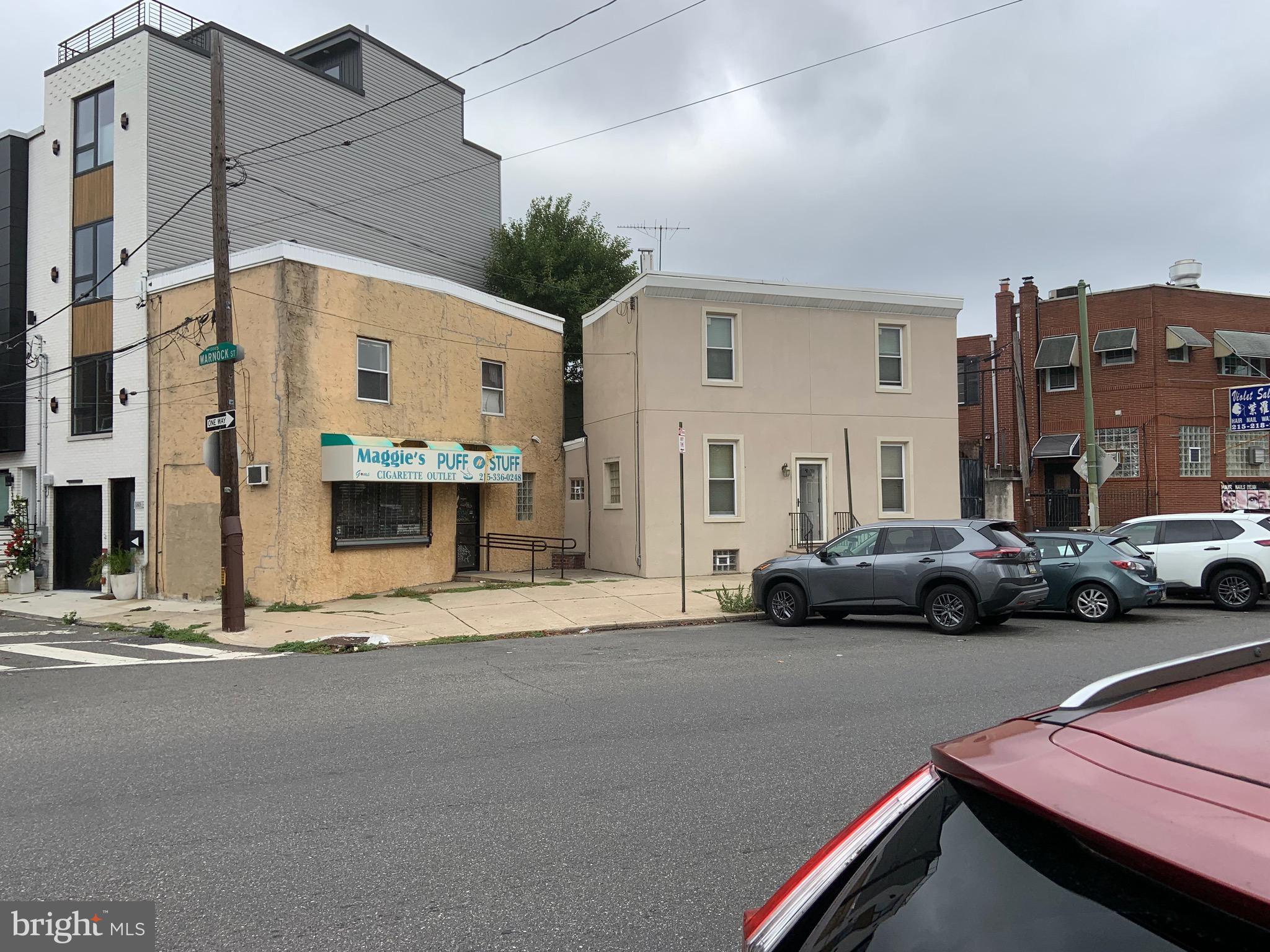Corner property in the heart of Passyunk Square facing the Acme Supermarket Shopping Center! The property is a/k/a 1019-21 Red St. Property is being sold in its present "AS-IS" condition! Property has 2 buildings on 1 site/lot! Property has the LOOP program for real estate taxes which reduce the rela estate taxes to what they are presently but new owner will not receive this tax reduction. Propery is less than 1 block from the East Passyunk Avenue Business District with many restaurants, shops etc! Property has a 2-bedroom 2-story home on the site and a separate store with a b-level living unit also which has a kitchen, bath and 2-bedrooms.on the same site. Both units have basements and separate entrances and 1 rear yard! Property has tremendous investment potential!