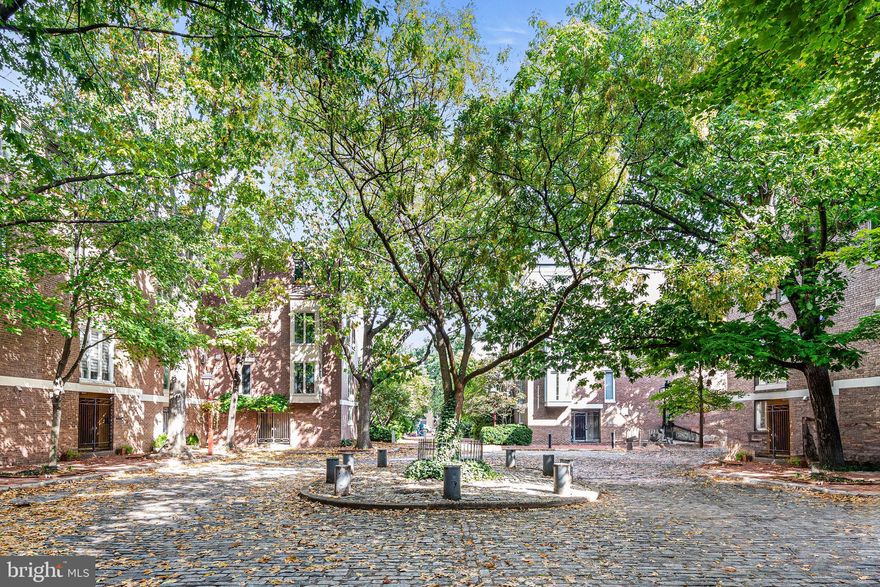 Come see this historic mid-century gem located on Lawrence Court in Society Hill. This 6 bedroom, 3.5 bathroom corner home with enchanting garden oasis and Deeded parking, is nestled on a charming cobblestone courtyard.  The property offers a unique opportunity for buyers with a vision for renovation. Original parquet floors throughout harken back to its historic mid century charm.

The first floor welcomes you with a vestibule, library, and powder room. Adequate closet space and a versatile basement open doors to imaginative possibilities for a secondary living area, office, or home gym.

On the second level, the living room boasts high ceilings and a classic fireplace. A connection to the expansive landscaped yard allows for a seamless indoor-outdoor living experience.

Take a half-flight of stairs, and find the light filled dining that connects to an a large kitchen with pocket doors, and open “window” overlooking the living room and garden

The third floor has 3 bedrooms and 2 bathrooms. The rear bedroom is an en-suite with tiled bath while an additional hall bath serves the two other bedrooms.

The fourth floor presents an open canvas for those with a vision. With 3 bedrooms and a hall bath awaiting a transformation, this level holds exciting potential.

The deeded parking spot in the private parking lot adjacent to the home. Located in the  McCall School catchment and just minutes from eclectic eateries, historic landmarks, shopping, multiple parks, theaters, hospitals, the business district, and universities.  The location also offers easy access to 95, 676 and the Ben Franklin Bridge.   Embrace the chance to reimagine this historic home and bring it into a new era of elegance.