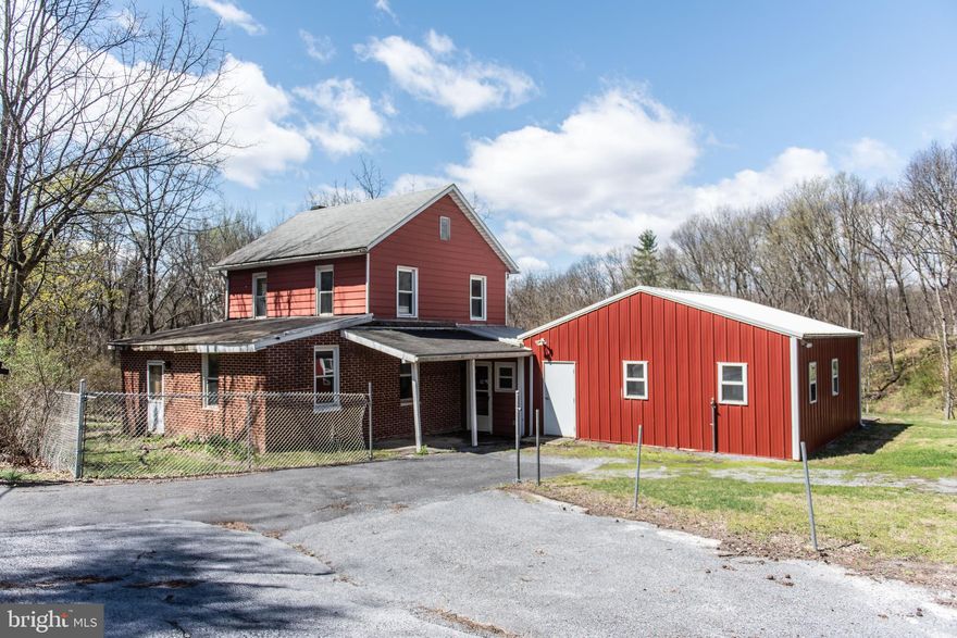 Investment Opportunity! Own a home, a workshop and a detached garage nestled on over 1.2 acres in Lower Dauphin School District.  You'll enjoy the peaceful setting with beautiful views of nature. The spacious workshop will delight carpenters and 'do it yourselfers' or use it for hobbies like painting and  pottery- the options are endless. The detached garage provides storage for vehicles, lawn care equipment, recreational vehicles and bikes or use the space to repair vehicles. The house needs some tlc so put your own stamp on it.
Located approximately 6 miles from Hershey Medical Center and minutes to local shops and restaurants, schedule your showing today!