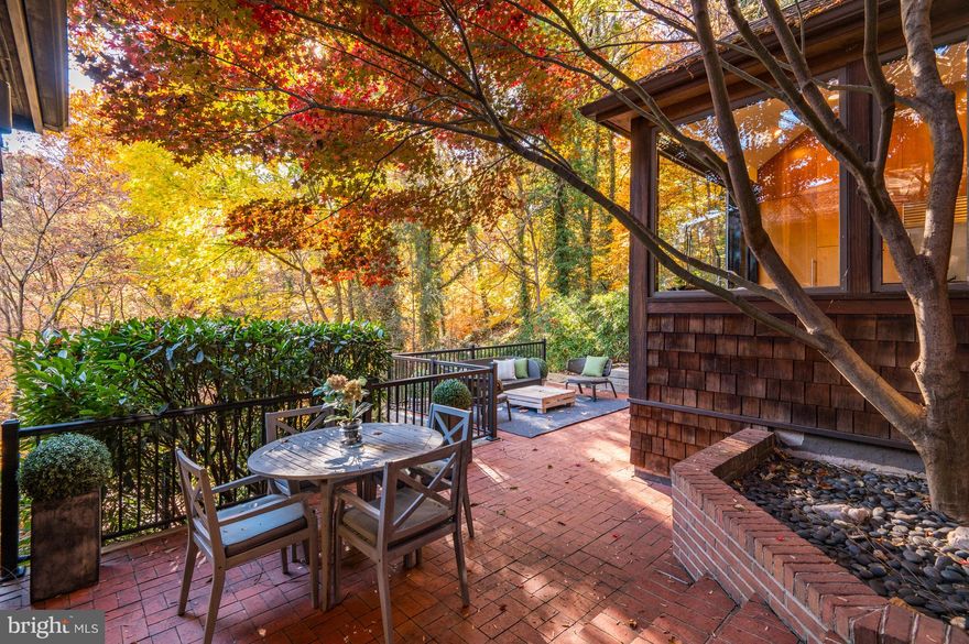 *OPEN HOUSE SUNDAY JAN 14th @ 12-2PM* Location, Location! Location! Unsurpassed tranquility and the ultimate in privacy is found in the special enclave of contemporary homes nestled high above the trees in Rock Creek Park. Just minutes to Connecticut Avenue, yet secluded and enveloped in lush green landscaping. Almost reminiscent of the homes sited high above Beverly Hills, California. Enjoy coffee in the morning on your patio and stunning views from inside out in every room. A captivating floorplan welcomes you into this special residence with an artfully designed foyer, step down formal living room with greenhouse floor to ceiling doors, spacious dining room, huge family room and gourmet kitchen with glass enclosed walls, top of the line appliances and sunlit warmth shining in. The main level includes a formal library/alternate fourth bedroom and full bath leading back to the entry foyer. Upstairs you will find a grand primary suite with sitting room and spacious primary bath, closets galore and views of the outdoors. Two additional light filled bedrooms and hall bath complete the second level. The lower level of the home leads to more than ample storage rooms, and an extra wide two car garage. Serenity abounds, and the calm and light filled atmosphere of this very special residence is one of a kind. Just off Connecticut Avenue and Porter Streets in NW Washington with easy access to great restaurants, shopping and public transportation. Approximately 30 minutes to National and Dulles Airports, and just under an hour to BWI Airport.