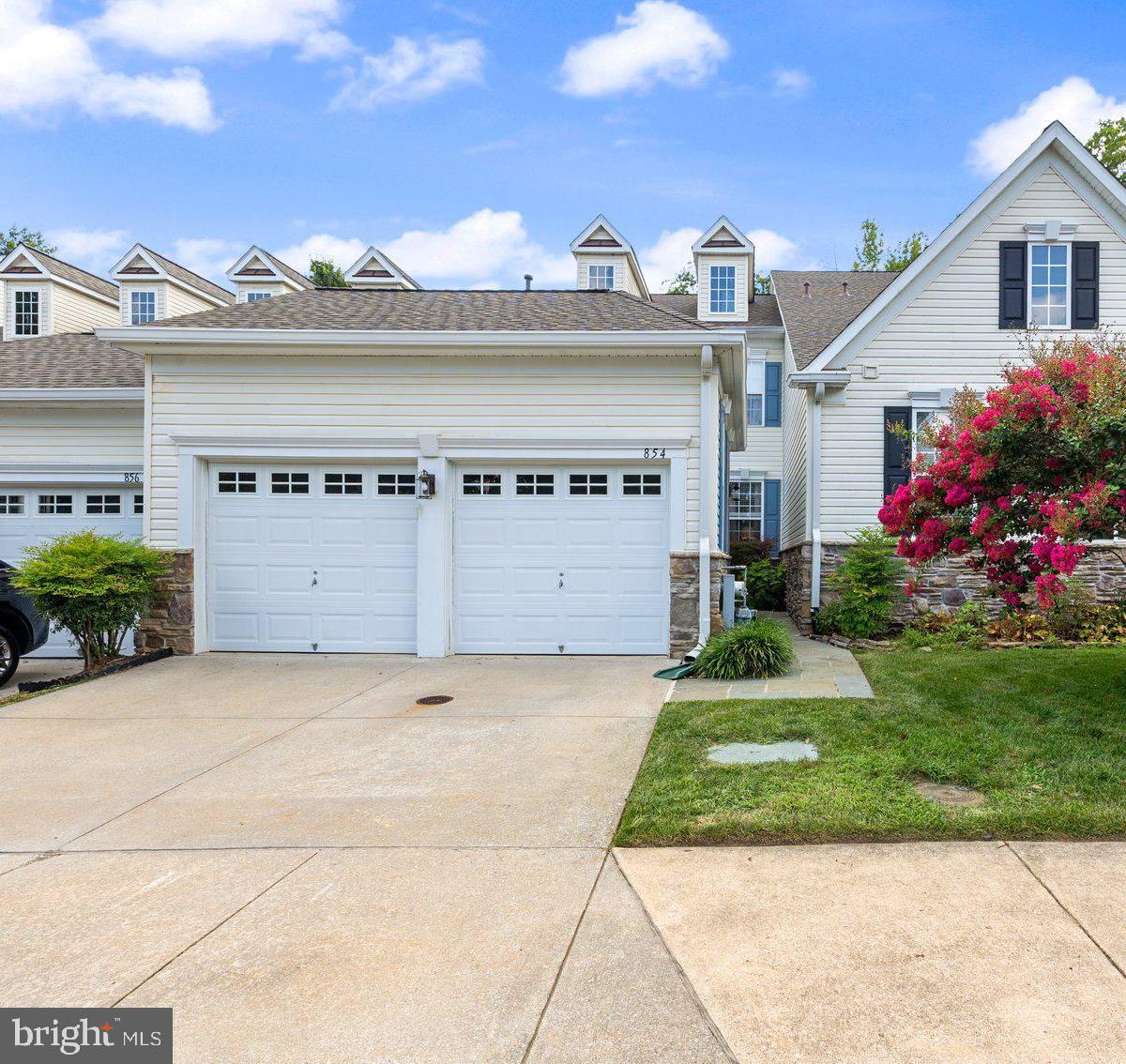 Welcome to this beautifully maintained and updated 3-bedroom, 2 full and 2 half bathroom townhome located in the highly desirable Piney Orchard community of Odenton. This spacious home features a 2-car garage, expansive basement with a bonus room that can be used as a movie room, guest room, or playroom, offering incredible flexibility for entertaining, guests, or multi-use living. The roof was replaced in 2024. The kitchen was updated in 2016 and boasts brand-new granite countertops (2023). Additional recent updates include a brand-new deck (2022), remodeled half bath on main level (2023), and new showers in both full bathrooms (2024). Upstairs offers three spacious bedrooms, including a well-appointed primary suite. The lower level adds tremendous value with ample recreation space and a second half bath. Located in the amenity-rich Piney Orchard community, residents enjoy access to multiple pools (indoor & outdoor), fitness center, tennis courts, playgrounds, walking/biking trails, and scenic nature preserves. Prime location with easy access to major routes (32, I-97, 295), the Odenton MARC Station, Fort Meade/NSA, and nearby shopping and dining at Waugh Chapel Towne Centre. This home offers a perfect blend of modern updates, functional living space, and unbeatable location. Schedule your showing today!