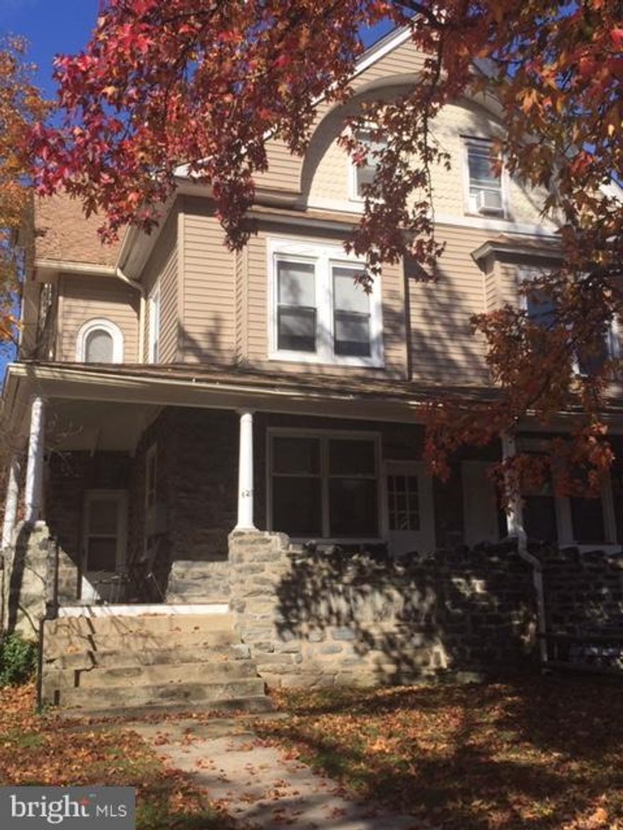 Second floor, large apartment, sunny, updated kitchen, new carpeting, off street parking. Walking distance to train and Suburban Square.