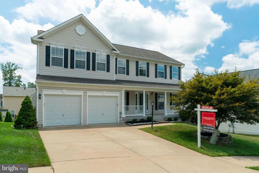 This house has it all so stop your search and make sure you're the first one in the door. More than 3700 square feet of finished space and the owners have prepped this house to perfection. Re-finished hardwood floors and brand new carpet throughout. Painted top to bottom with Sherman Williams Alpaca and bright white trim and ceiling. The family room is enormous and in addition to that the kitchen has a wonderful morning/sunroom. So much natural sunlight. A gourmet kitchen with stainless steel appliances, gas cooking, richly colored cherry cabinets, an island, and tiled back-splash. The master bedroom has vaulted ceilings, two walk in closets and a huge en-suite bathroom with large soaking tub and separate shower. Granite counter-tops in both upstairs bathrooms and new light fixtures throughout the entire house. The basement level is a true walk out and has a tremendous bedroom and full bath. Also a large rec room and additional space that could be an office or media space. Tons of storage. The roof is brand new! This house truly has it all, don't wait, it won't last!