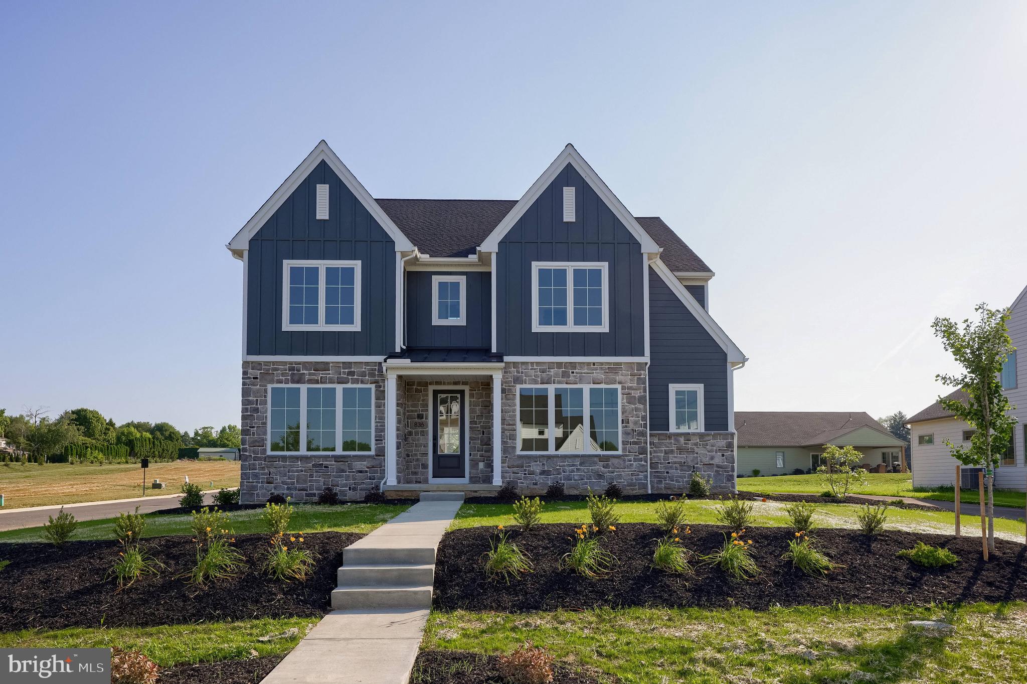 The Ashburn by Pine Hill Building Co. is a thoughtfully designed 4-bedroom, 3.5-bath home that offers a bright and airy atmosphere, thanks to its large windows and spacious layout. A welcoming foyer and wide hallways enhance the open feel of the home. On the first floor, you'll find a dedicated home office, a family room, a dining area, and a well-appointed kitchen featuring an 8-foot island, perfect for gathering and entertaining. The second floor includes a Jack & Jill bedroom and bath, a private ensuite bedroom, and an owner’s suite with a glass-and-tile shower and an expansive walk-in closet. For added convenience, the laundry room is also located on the second floor and is directly connected to the owner’s walk-in closet.