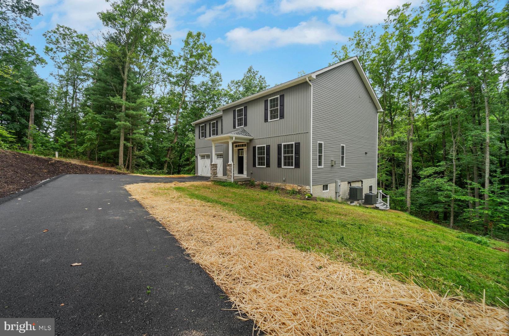 A Must See!! Custom home built by Cutting Edge Contracting, Inc., local builder for 24 years.
Appraised by Six, McLain & Associates at $830,000. Copy of appraisal in documents.
4 bedroom, 3.5 bath
3,576 +/- sq. ft. Colonial house on 2.1 wooded acres ( 2,706 sq ft above grade, 870 sq finished in basement)
Energy efficient home
NO HOA
Linganore High School feeder
A large insulated 2 car garage with automatic door openers and keypad
Paved driveway
Covered Front Porch
Vinyl siding, stone veneer on front
No maintenance exterior (all aluminum, vinyl and fiberglass)
Well and Conventional Septic
Finished Basement with sliding walk out with stairs 145 sq ft unfinished.
Trane XR15 HVAC system with 2 programmable thermostats for 2 units
Whole house humidifier
Simonton vinyl double hung windows with lifetime warranty
Whole house sediment filtration system
Cat 6 ethernet wire ran to all floors
1st Floor
White oak hardwood floors throughout first floor from local planning mill
Hallways are all 4ft wide as well as stairways.
Built-in cubbies and large pantry
Gourmet kitchen with hardwood cabinets, quartz countertops, stainless steel appliances including gas range, refrigerator, dishwasher, microwave oven
Gas fireplace with stone veneer surround in great room
9 ft ceilings
LED recess lighting throughout
2nd Floor
4 Bedrooms (includes primary)
Primary bedroom with tray ceiling
Primary bedroom with 2 walk-in closets
Primary bath with tile floors, tile shower with door, standing tub and double bowl quartz vanity
Laundry room with washer and dryer, laundry sink, and shelving
Bedroom 2,3 and 4 are large bedrooms with closets
Full bathroom with tub/shower and double bowl quartz vanity
Hallway closet
LED recess lighting in hallways and primary bedroom
Ceiling Fans in all bedrooms
Basement
Rec Room
Office
Full Bathroom with tiled shower and tiled floors
Wet bar with sink and bar refrigerator
LED recess lighting
ceiling fan in office
LVP flooring
Unfinished storage space