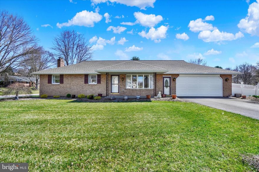 Nestled in a sought-after neighborhood, within top-rated Dallastown School District, and located minutes to I83 Loganville and Leader Heights Exits, this one-owner 3BR, 2BA brick rancher has been lovingly maintained over the years. With solid construction and great bones, the property offers a fantastic opportunity for buyers looking to personalize a home to their taste. The spacious layout provides a comfortable living environment with a living room, eat-in kitchen, hall bath with access to the primary bedroom, and laundry on the main floor. The daylight lower level features a family room with a brick fireplace, full bath, unfinished storage room, large workshop (wood working saws and equipment conveys), and unfinished utility room. A 2nd set of stairs leads directly to the finished 2-car garage. Countless hours are sure to be spent on the covered front porch or covered rear patio overlooking a beautiful partially fenced, corner lot perfect for outdoor enjoyment, whether it’s gardening, entertaining, or simply relaxing.   The home’s prime location ensures quick access to I83 making it ideal for commuters. You are also a stone throw to Nixon Park where you can trail hike, visit the Nature Center, or attend a Themed Program. In addition, Lake Redman, William Kain Park, and York County Heritage Rail Trail are nearby......and don't forget about Brown's Orchard & Farm Markets in Loganville!  While the home is in need of some cosmetic updates, it presents a wonderful chance to build instant equity. The well-kept home serves as a strong foundation for modernization, whether it’s updating the kitchen and baths, replacing the carpets, or adding fresh paint. Finished 2-car garage with stairs to lower level, two service doors, and pull-down attic storage.  NEW 50yr architectural shingle roof in 2020; NEW 4-zoned, oil boiler in 2012; and NEW central air conditioning in 2010. It’s a rare opportunity to own a home that can be transformed into a true gem, while maintaining its value for years to come. Don’t miss out on the potential this home has to offer!  AGENTS - Please read Agent Remarks!