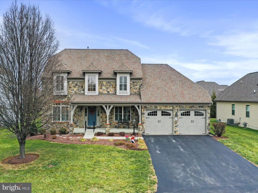 Immaculately well  kept stone front contemporary in gated sought after Beallair community with plantation shutters throughout. This home features a main floor primary bedroom with a tray ceiling, walk-in closet, bath with double sinks, soaking tub and separate shower. The open floor plan offers a huge family room with a gas fireplace, vaulted ceilings, crown molding  and hardwood floors. A separate dining room with hardwood floors, chair rail and crown molding. Large country kitchen with stainless steel appliances, recess lighting, Corian countertops, pantry and an island. Separate laundry room off of the two car garage. Upstairs are two bedrooms with walk in closets and a full bath. The mostly finished basement has a huge recreation room, 4th bedroom, utility room and half bath. Walk up and out wide basement stairwell. Screened back porch, patio and extensive mature landscaping finish off this stunning home. Make an appointment to see today.