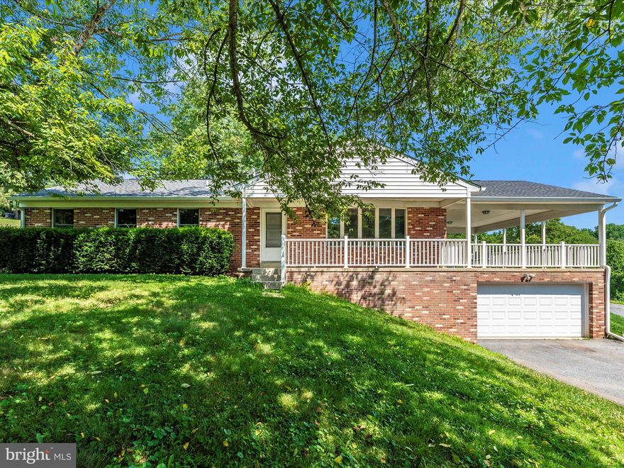 NEW PRICE, NEW HVAC SYSTEM. Discover this beautifully updated home offering comfort, space, and convenience. As you approach, a generous wraparound porch welcomes you—perfect for relaxing, entertaining, or enjoying peaceful morning coffee. A second front porch adds even more charm.

Inside, the home is truly move-in ready with new flooring, fresh paint, updated appliances, and brand-new HVAC. All three bathrooms have been tastefully renovated, and major systems are in excellent shape, including a 2022 roof, new high-efficiency electric heaters, a newer water heater, and a water softener. The well water has been tested, with reports available.

The spacious layout features large bedrooms, a bright living room, and an inviting kitchen, plus a convenient hallway laundry chute leading to the new washer and dryer below. The primary suite includes an updated private bath and walk-in closet.

Gently lived-in and freshly refreshed, this home offers the perfect blend of country tranquility and commuter convenience—just 7 miles to Frederick, 6 miles to I-270, close to MARC train stations, and minutes from vibrant downtown Jefferson.
