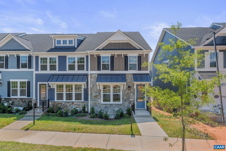 This Dogwood END townhome is located in Glenbrook, set among Blue Ridge Mountain views, parks and walking trails, yet minutes from downtown Crozet. This earth-friendly, farmhouse-style townhome features two stories with a basement, which includes a rec room, half bath, and rear-entry, 2-car garage. The open main level showcases the kitchen, with oversized central island, LUXE black cabinets that contrast beautifully with the gold fixtures, a walk-in pantry, and stainless steel appliances. Upstairs, the primary suite, 2 additional bedrooms, a full hall bath, and laundry complete the home. Thoughtful and quality included features throughout, including a 2-car attached garage, oak stairs, solid core doors, wood shelving, upgraded trim, energy efficient furnace, the list goes on. Walking path to Crozet Park and direct access to Downtown Crozet from community.  Tot lot on same block! Similar photos.,Granite Counter,Painted Cabinets,White Cabinets