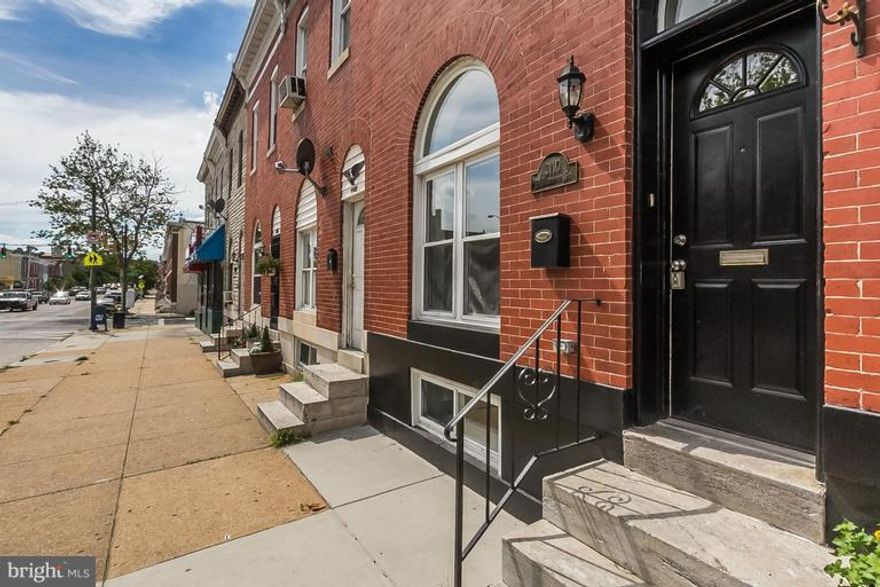 PREMIER BALTIMORE STREET HOME W/ALMOST 2000 SQFT OF FINISHED SPACE! Open floor plan, hardwoods, gourmet kitchen w/island, master suite w/custom tiled shower, seperate full hall bath perfect for room mates, great storage and rear porch/deck. Walk to wonderful Patterson Park. See Today.
