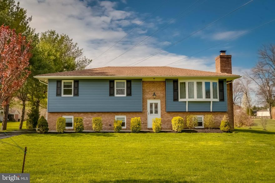 Just take a look at the beautifully updated 4 bedroom, 3 full bathroom home in White Marsh.  Home was renovated a few years back and exterior siding was recently replaced.  At the time of renovation the HVAC, windows and hot water heater were replaced.  The kitchen features updated cabinets,  granite counter tops and stainless steel appliances.  The bathrooms  on the uppper level are all tile. The livng room has a fireplace for those cold winter nights.  The main level also has decorative molding  in many areas.  The lower level features a large "L" shaped family room with a pellet stove. This level also houses the 4th bedroom and 3rd bath . The rear porch has access to the deck and above ground swimming pool which is only a few years old.  The laundry area is huge and has space for storage. The garage is an oversized 2+ car garage is a mechanics dream. There is also another pellet stove in the garage that remains. Take a look and you will fall in love!