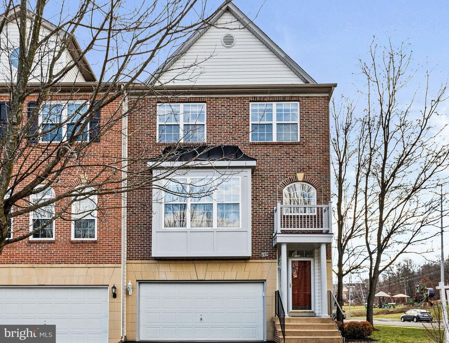Welcome to 6570 Kiernan Court, a sunny and bright brick end-unit townhouse in highly sought after Kingstowne.  Three spacious levels with a two-car garage, freshly painted throughout, and hardwoods on the main and upper levels.  Magnificent location within the community, this townhouse offers a kitchen with granite countertops, breakfast bar and 42 inch cabinets.  Open to the cozy family room with a gas fireplace, adjacent dining area and access to the beautiful trex deck with views of the green spaces and state-of-the-art playground.  The lower level features tile flooring, rec room, half bath and a walk-out to the fenced in backyard. New sliding glass door, 2023. New roof, 2019.  New A/C, 2021.
