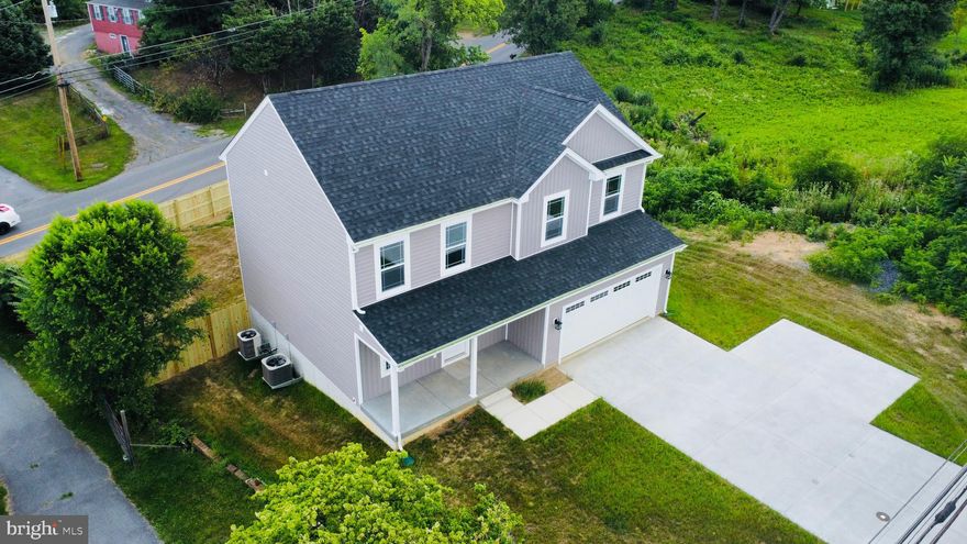 Brand New Home Just Completed with 6ft privacy fence waiting for its new owner! Conveniently located mins from Rt. 9.  Beautiful 4-bedroom colonial style home, with 21' x 20'  2 car garage with openers, covered front porch, kitchen offers 36-inch cabinets with granite countertops, pantry closet and stainless-steel appliances, large living rm, LVP flooring thru entire main floor, dual heating and air conditioning, laundry room is located on same floor as bedrooms with utility sink. Large primary bedroom with tray ceilings, the primary bath offers double vanity sinks, 5 ft shower with glass doors and walk-in closet off of master bathroom. Full unfinished walk-out basement rough-plumbed for future bath.