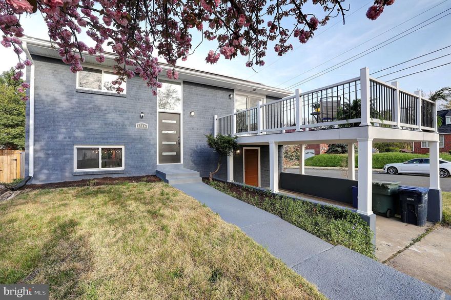 Experience the epitome of luxury living in this stunning two-level single-family home, perfectly situated on a sought-after corner lot. With 2,000 square feet of thoughtfully designed living space across both levels, this home blends modern sophistication with unique design elements. It features 4 spacious bedrooms and 3 full bathrooms, with each level offering private in-suite accommodations for added comfort and privacy. Enjoy breathtaking views of the Washington Monument and the US Capitol right from your living room, enhancing the home's exceptional appeal. Step outside to a private patio, creating a peaceful outdoor retreat ideal for relaxing or hosting gatherings. The lower-level ensuite offers versatile possibilities, including potential rental income opportunities. With paid-off solar panels, this home offers an energy-efficient and sustainable living option, helping to reduce utility costs. Additionally, there is convenient on-site parking, as well as street and private parking for residents and guests. Situated in a lively neighborhood with easy access to a range of amenities, dining, and entertainment, this home provides both comfort and convenience.