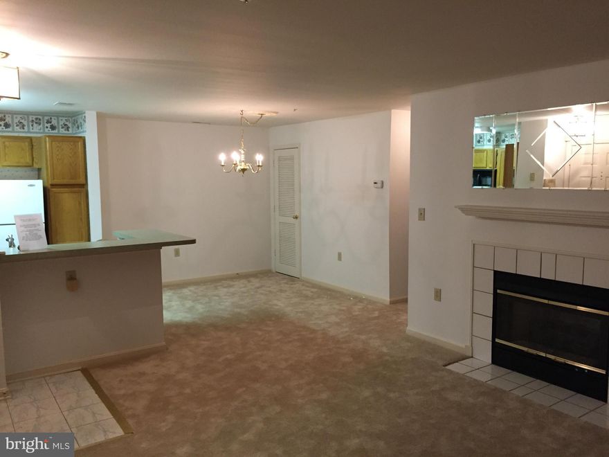 OUTSTANDING MAIN LEVEL CONDO READY FOR IMMEDIATE OCCUPANCY AND PRICED TO SELL! FRESH PAINT &NEW, NEUTRAL CARPET; OPEN FLOOR PLAN FEATURING A LIVING ROOM WITH A GAS FIREPLACE AND SLIDERS TO THE PRIVATEPATIO; KITCHEN BOASTING CERAMIC TILE FLOOR AND GLEAMING OAK CABINETRY; LARGE MASTER BEDROOM WITH WALK-INCLOSET AND ACCESS TO AN UPDATED FULL BATH. USE SHOWING ONLINE AT MRIS. SEE UPLOAD APP.