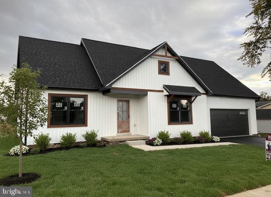 NEW BUILD! MOVE IN READY!   Welcome to 621 Spring Ave., located in South Western Hanover! This Custom Built 3 Bedroom, 2 .5 Bath, 1,640 finished Sq Ft. Ranch Home is waiting for you! This Custom Home by Bon Ton Builders, Inc exemplifies the convenience of State-of-the-art living. The heart of the home is the Great Room Area with its Cathedral Ceilings and Light-Filled Open-Concept Design. The Gourmet Kitchen Features a Large Island with a Dining Room for seating and a cozy eating. The Owner's Suite is privately tucked away and Features a Private Bath and a Walk-in Closet.  There are 2 additional Bedrooms and a Full Bath on the second floor. This Great location in South Western Hanover community offers a quiet setting close to Schools and Downtown Hanover.  Don't miss out on this beautiful Custom Home!