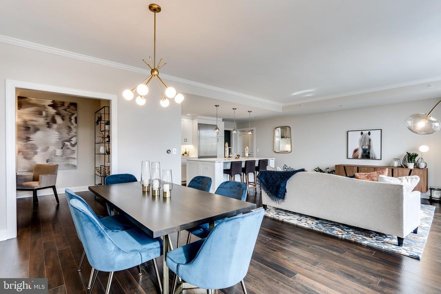 CALL TODAY TO SCHEDULE AN IN PERSON OR VIRTUAL TOUR! FANTASTIC VALUE IN BETHESDA! Great opportunity to own brand new condo in one of Bethesda's premier buildings, Hampden Row! 1,785 sq ft condo featuring an open floor plan, nine-foot-high ceilings and hardwood floors. The kitchen has white quartz counters, a Gaggenau refrigerator, a Thermador gas range and warming drawer, and a Bosch oven, hood, dishwasher and microwave. The master suite s bathroom is outfitted with marble flooring, a glass-framed shower and a stand-alone soaking tub. The building has a 24hr attended lobby, residents' lounge, rooftop fitness center &landscaped rooftop terrace. Toll Brothers will pay closing costs, ask for details...