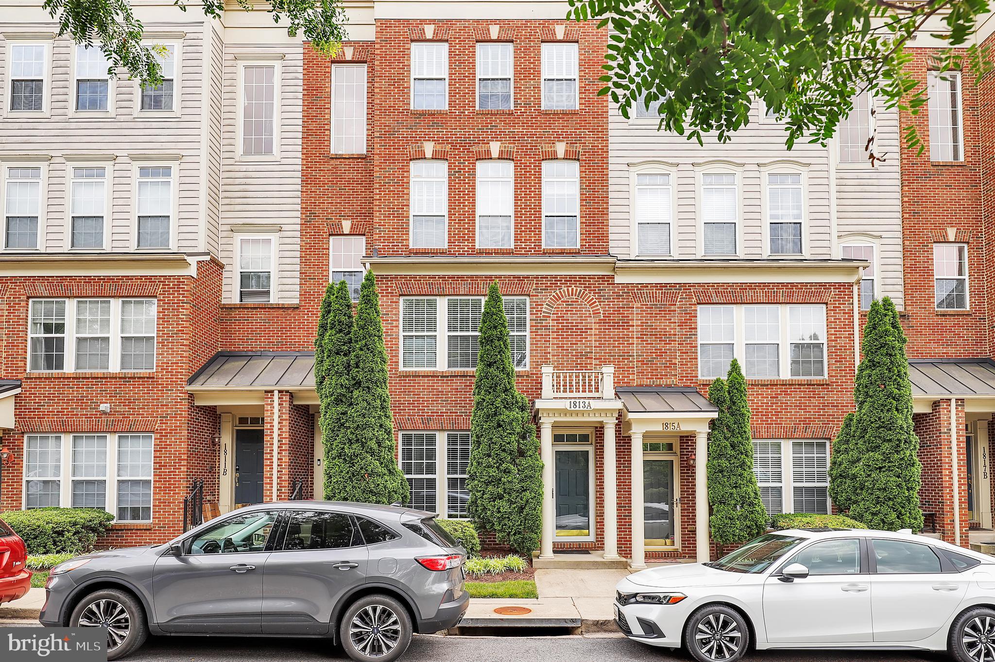 Welcome to this thoughtfully designed townhome in the heart of Frederick, MD. The open-concept main level features a bright kitchen and living area filled with natural light from large windows. The kitchen includes stainless steel appliances, granite countertops, and white cabinetry—ideal for everyday living and entertaining. The living room offers a warm, comfortable setting with a fireplace and modern fixtures.
Upstairs, you'll find three well-proportioned bedrooms, including a primary suite with a private bath featuring contemporary finishes and a calming color palette. The additional bedrooms offer ample space for guests, a home office, or hobbies. Light-toned flooring and a neutral color scheme flow throughout the home, offering a versatile backdrop for any style.
Enjoy low-maintenance living in a convenient Frederick location close to shops, restaurants, and major routes.