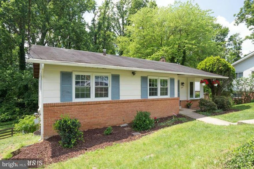 Large 4 bedroom 3 full bath. Master Bath Updated Recently.Hardwood floors throughout, Large deck off the kitchen, View from the house to a large backyard facing expansive trees,Great for Privacy, End of Cul de Sac, Large LL Rec Rm at walk out basement with a cozy fireplace, some newer appliances. Walk to shopping center, playground, Woodson High School District. Commuter Bus to Pentagon nearby.