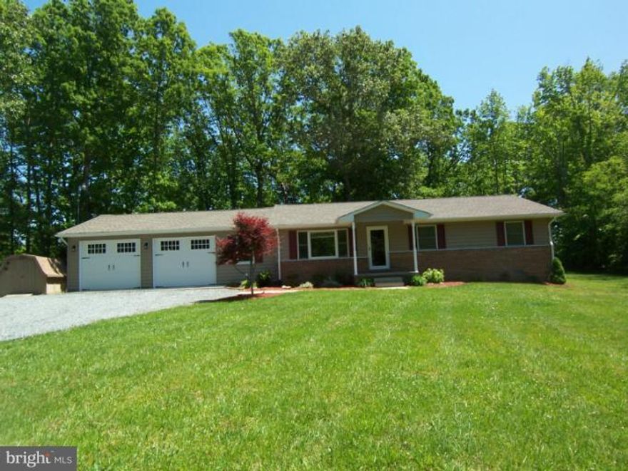 Picture perfect 3 bedroom 2 full bath rambler with 2 car+ garage in the country!! Very private . All appliances including  washer and dryer. .Security system, deck and wonderful yard . Shed for extra storage. Rent includes water and sewer.