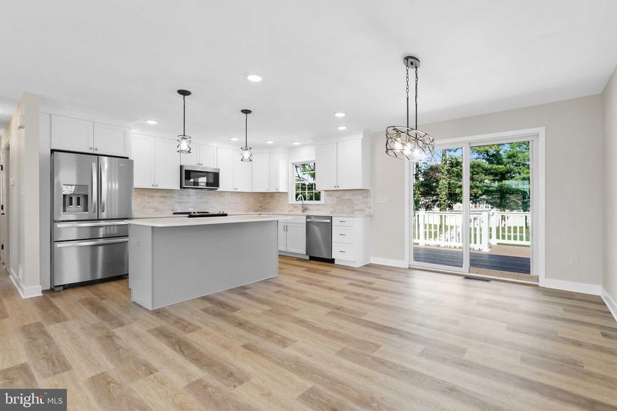 Stunning completely renovated home in Brentwood Park! Open kitchen with white shaker cabinets, quartz counters, island with pendant lights and stainless steel appliances. New faucets come with lifetime stem warranty, and appliances that have 5 year extended warranties will be transferred to the purchaser. Primary bedroom with two closets and en suite bath with stand up shower. Brand new Andersen series 400 windows with full screens and both sashes operate and tilt for cleaning. These windows come with a 20 year glass warranty.  The lower level is fully finished with a large family room area with gas fireplace, two additional bedrooms, full bath and laundry room. Beautiful composite deck and paver patio perfect for outdoor entertaining!  Mohawk LVT and new LED lighting throughout this home that features USB charging ports in every outlet. Store everything you need in the 12'x12' Storage unit. Whether warm or cold, you will keep your home just how you like it with brand new high efficiency TRANE HVAC system,  front and rear doors are THERMA TRU fiberglass doors and finally an additional 12” of insulation in attic areas to make a minimum of R-49 value. Send the kids off to Fallston Middle and High School.  Absolutely gorgeous!